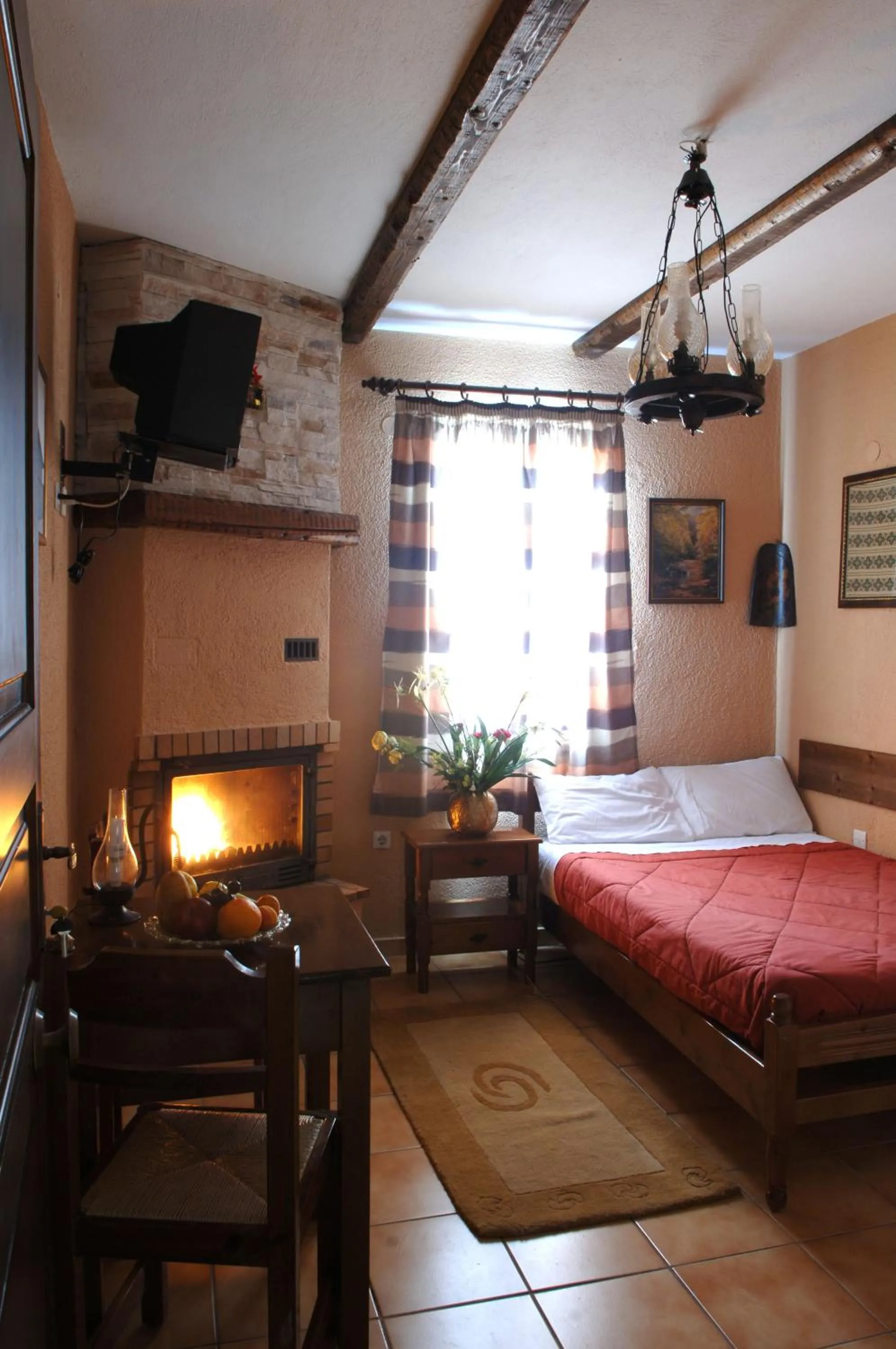 Bed in Rigas Hotel Arachova