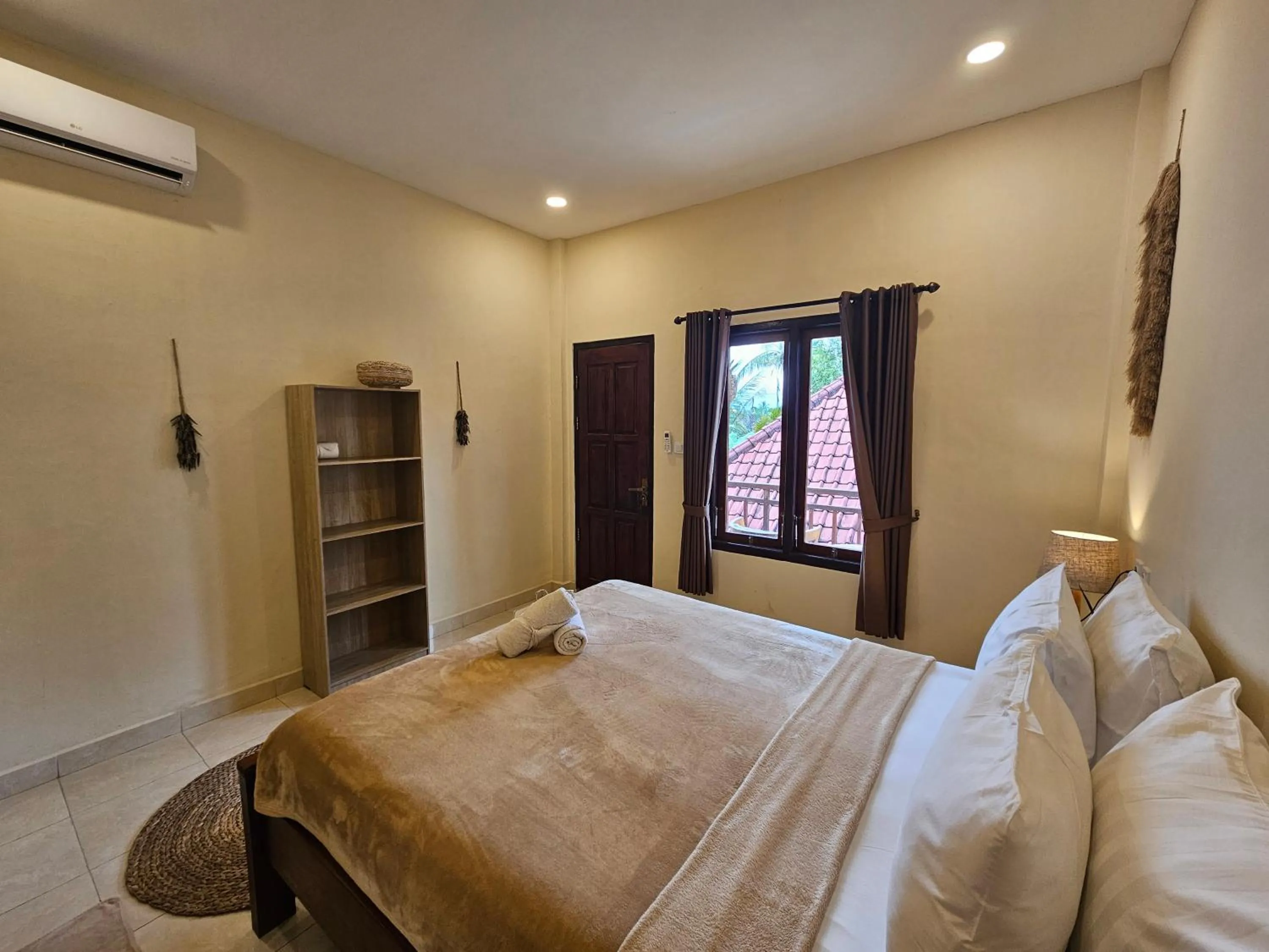 Bedroom, Bed in Risna Homestay