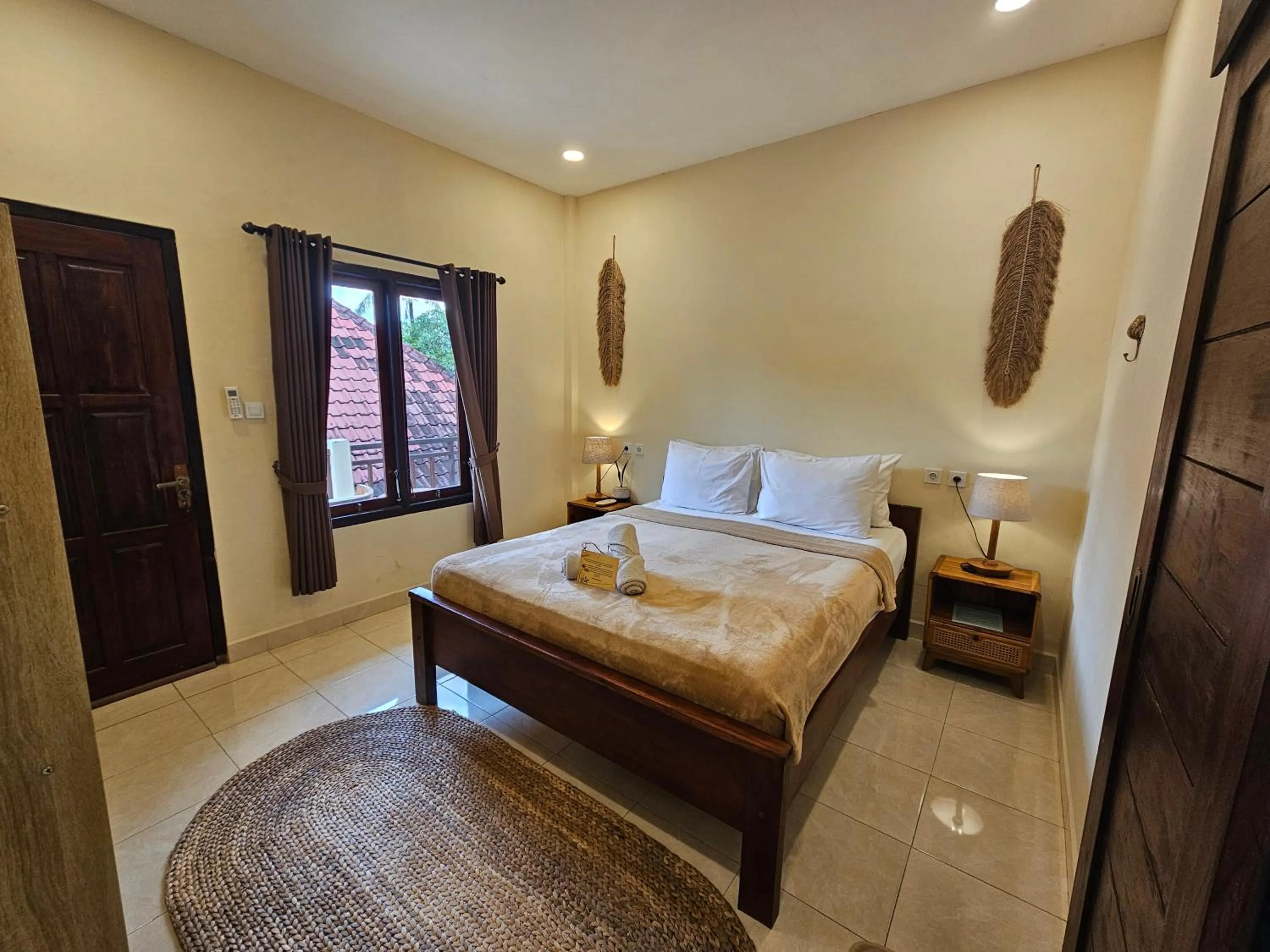 Bedroom, Bed in Risna Homestay