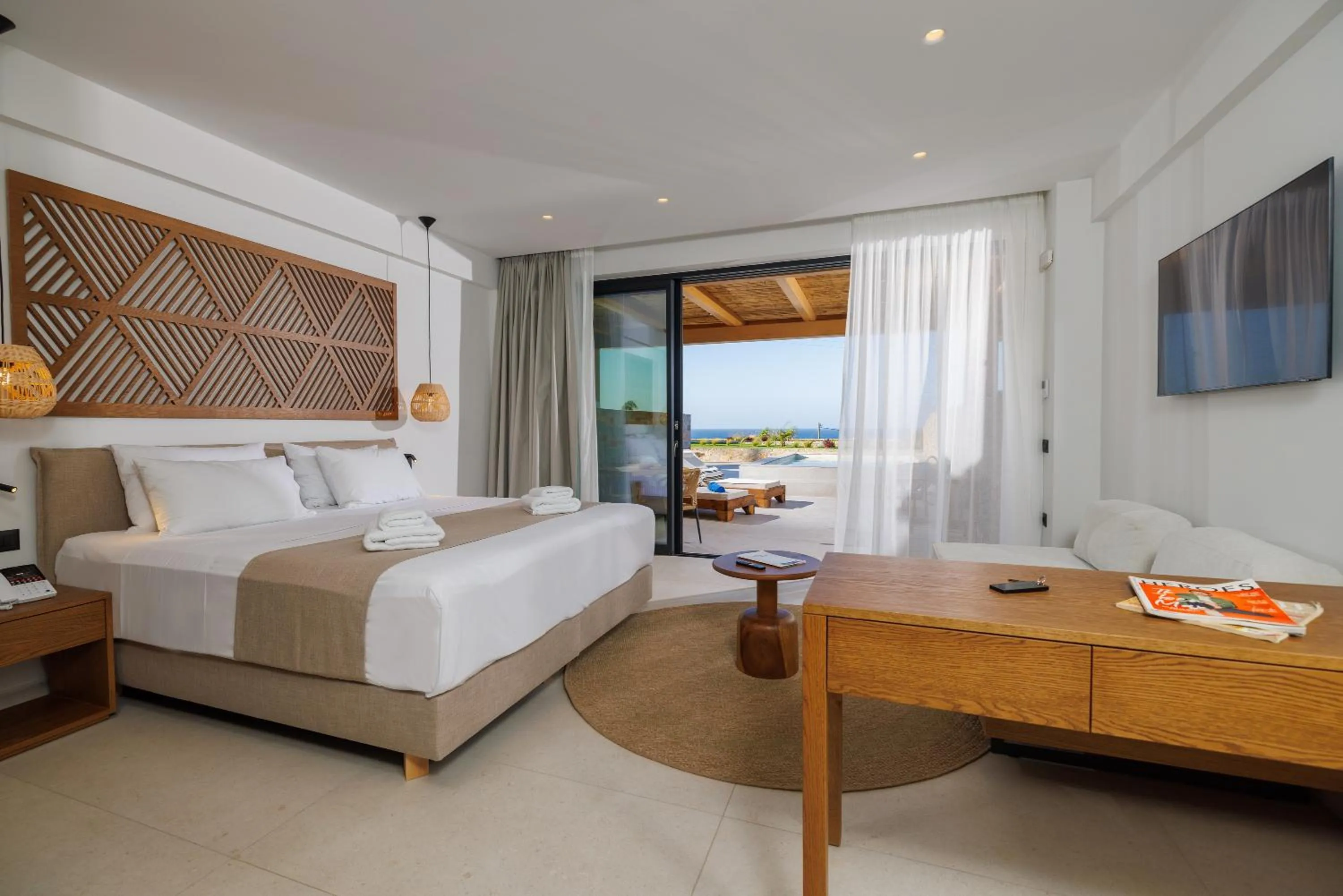 Bed in Deos Luxury Suites - Adults Only