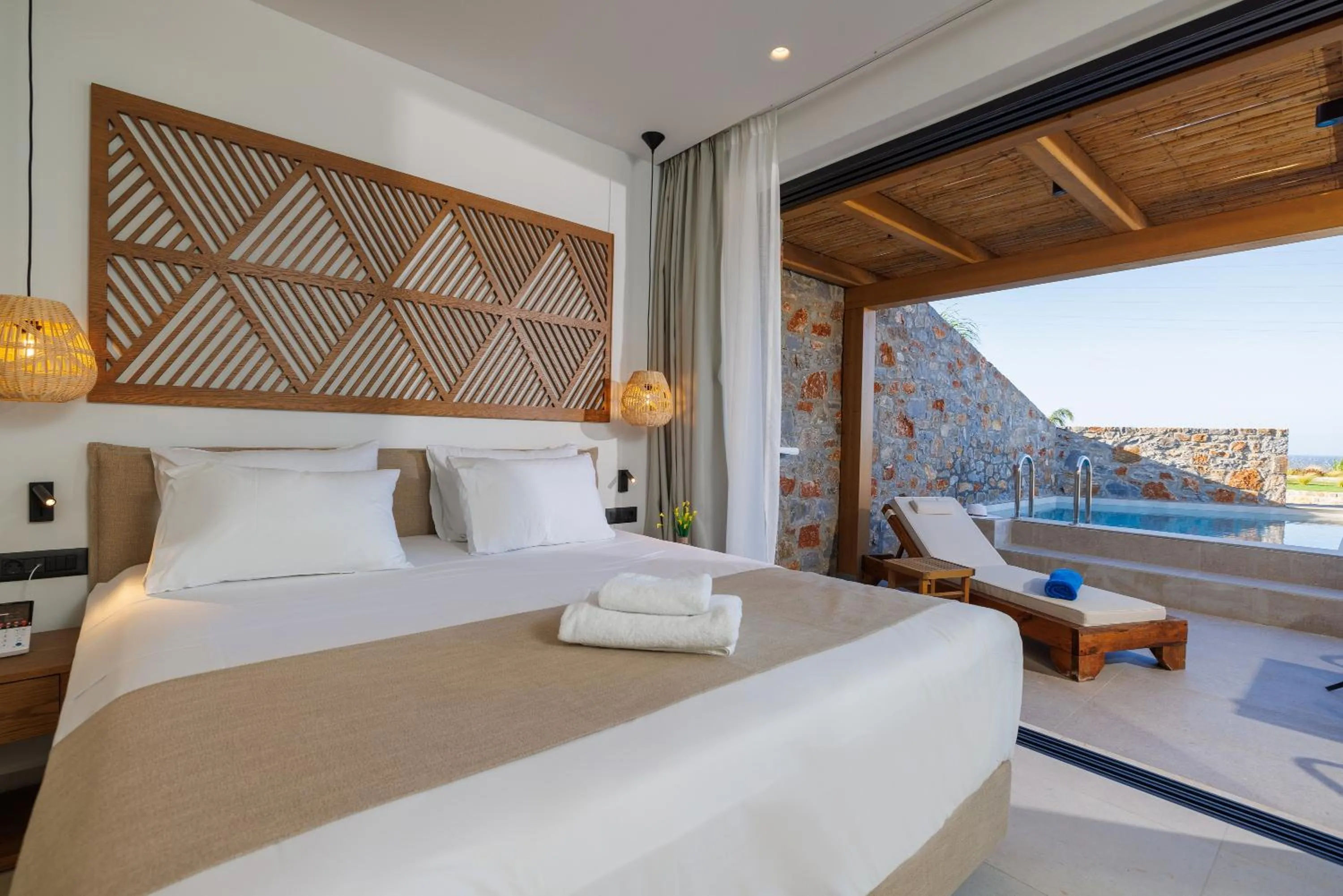 Bed in Deos Luxury Suites - Adults Only