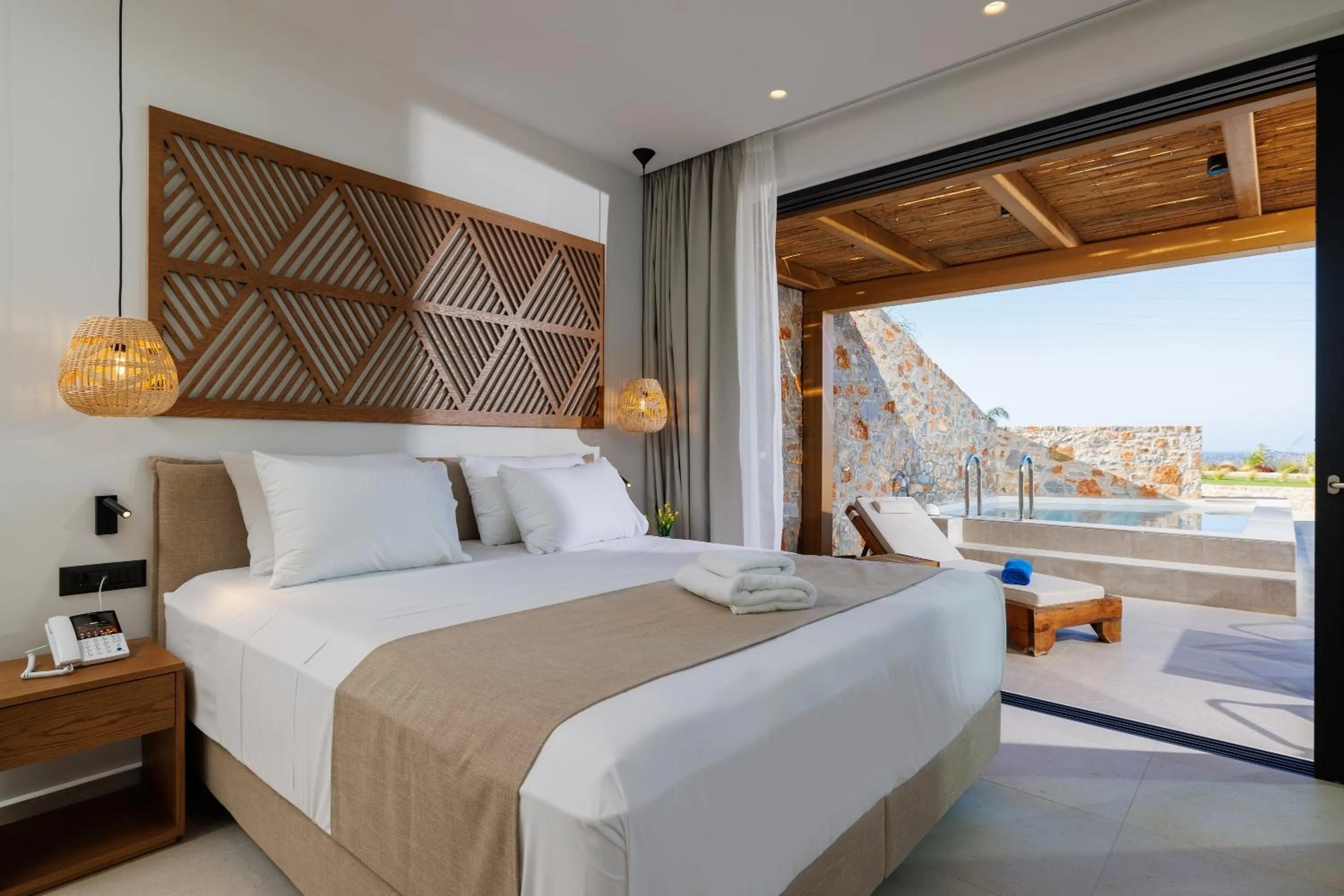 Bed in Deos Luxury Suites - Adults Only