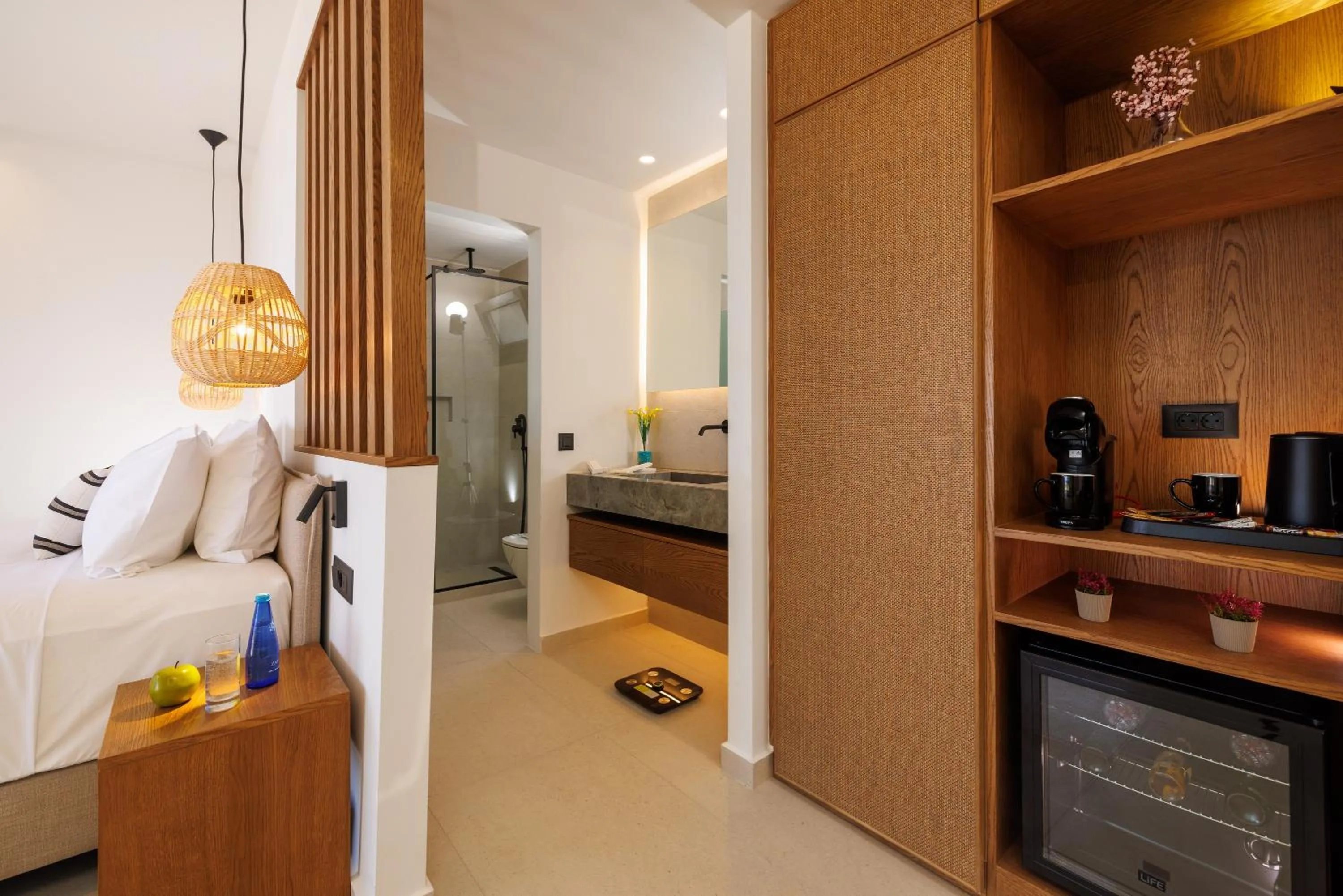 Bed in Deos Luxury Suites - Adults Only