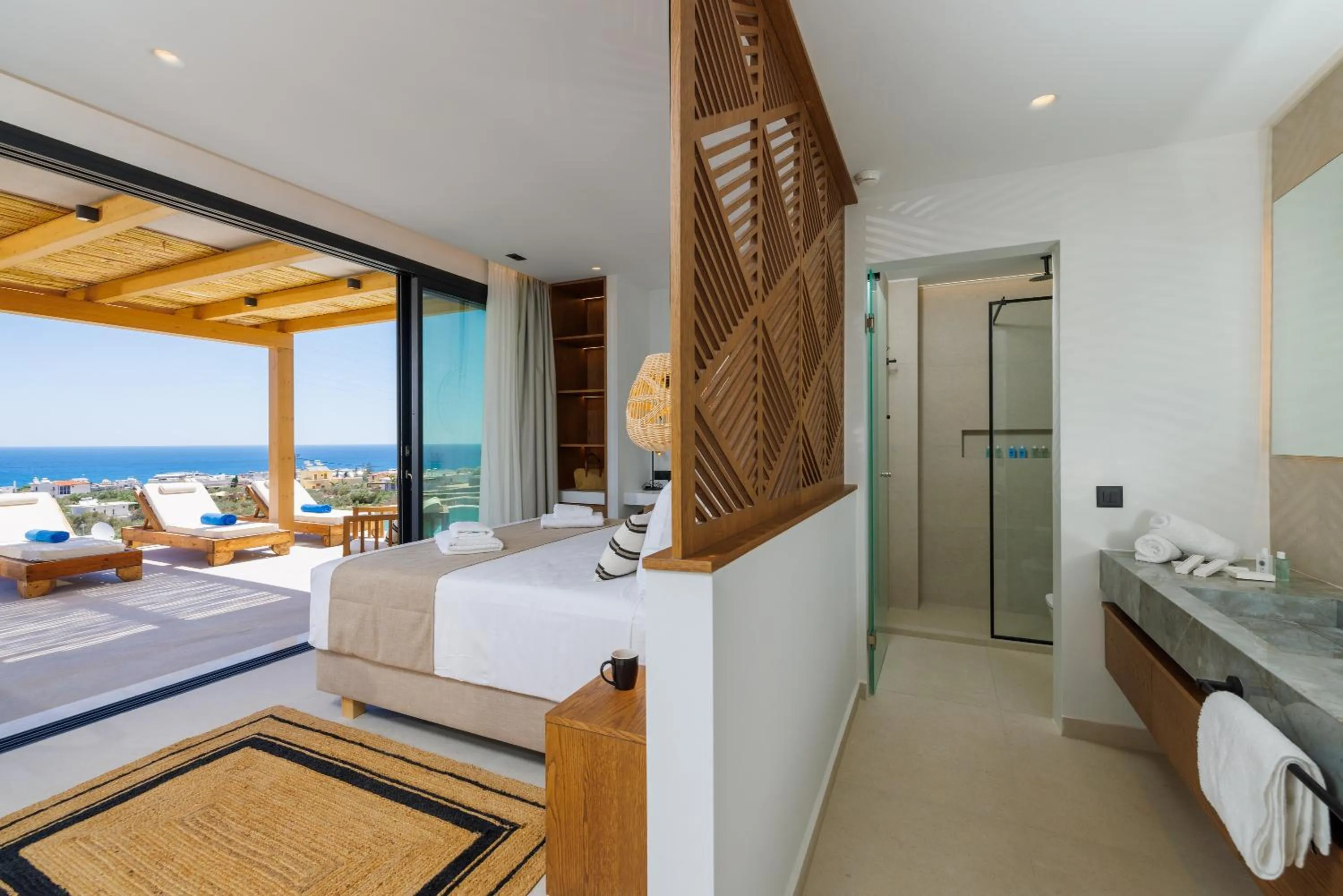 Bed in Deos Luxury Suites - Adults Only