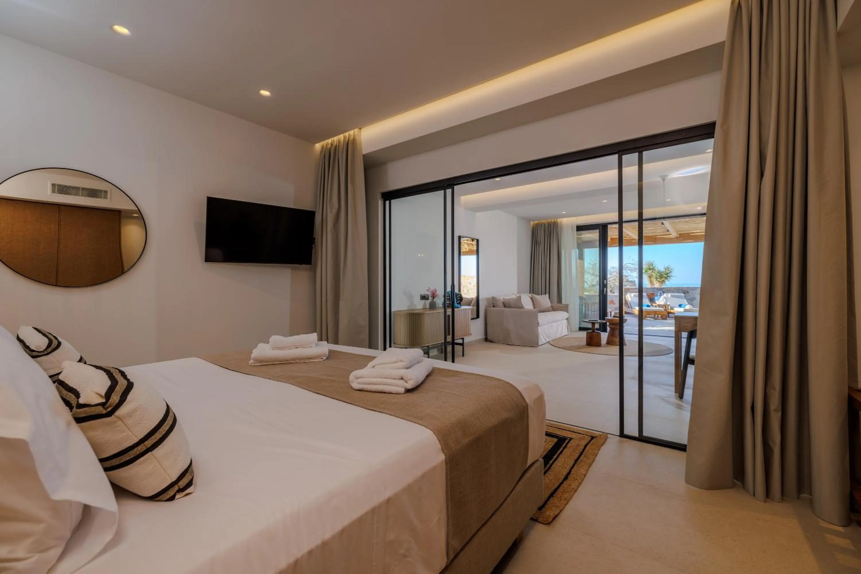 Bed in Deos Luxury Suites - Adults Only