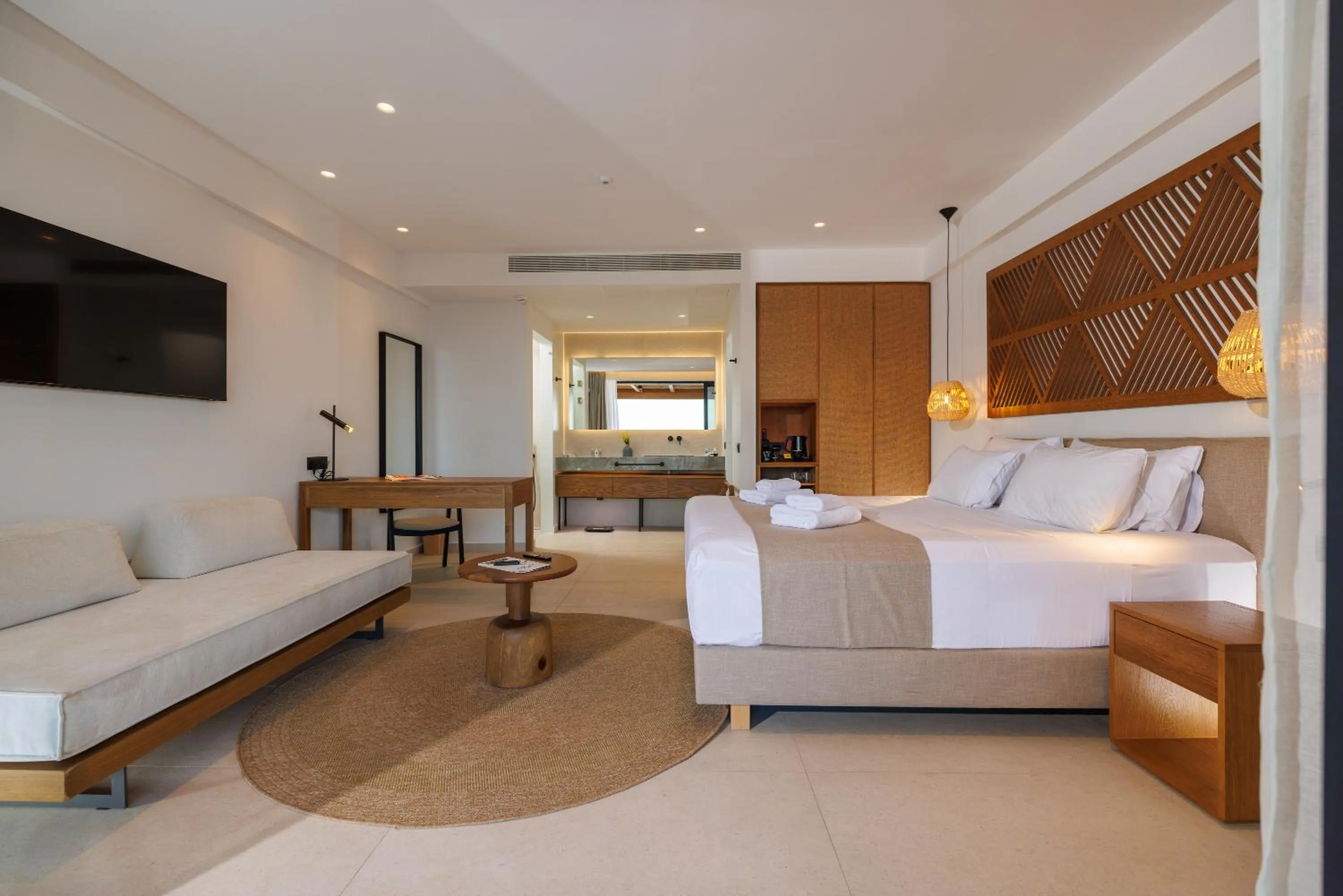 Bed in Deos Luxury Suites - Adults Only