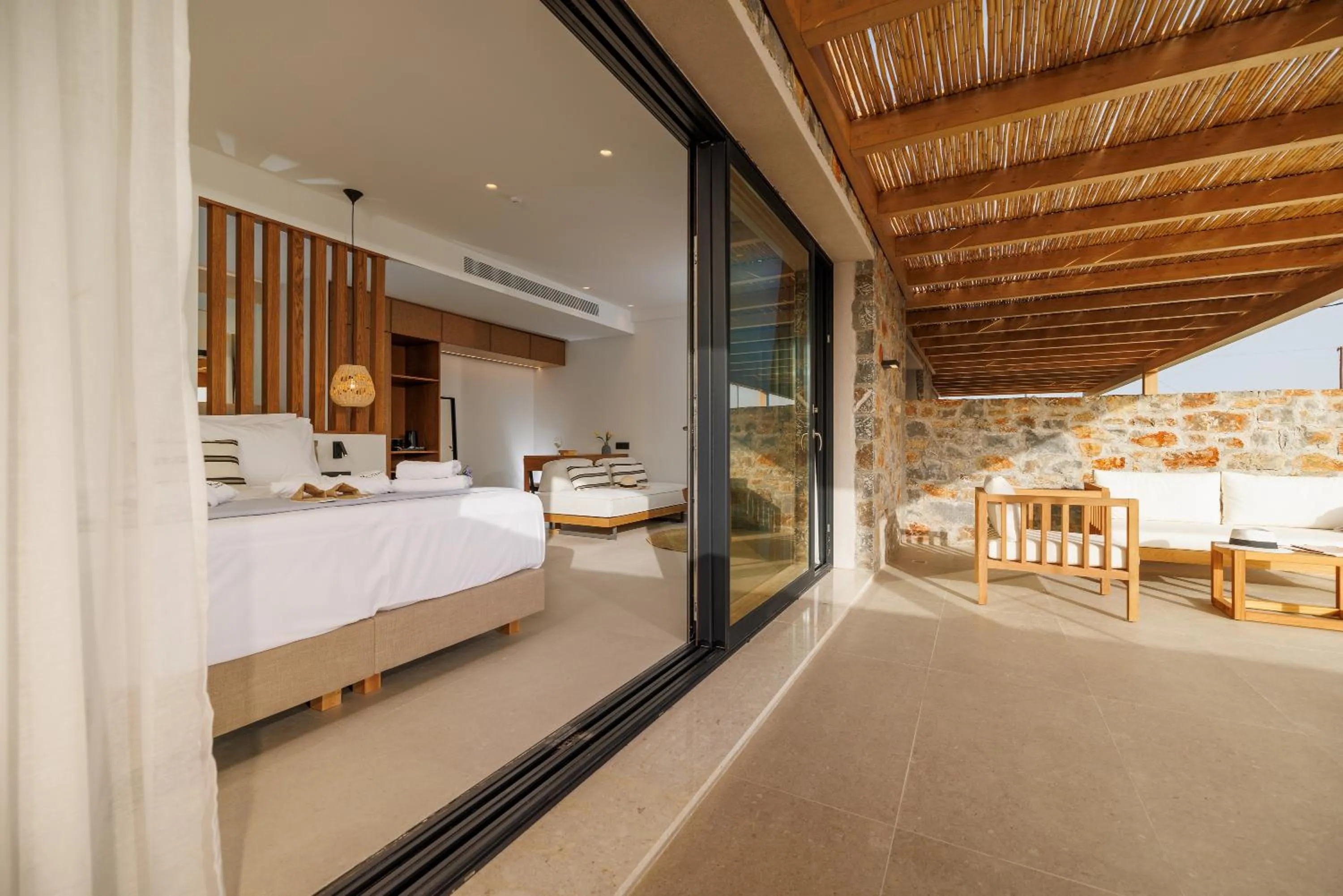 Bed in Deos Luxury Suites - Adults Only