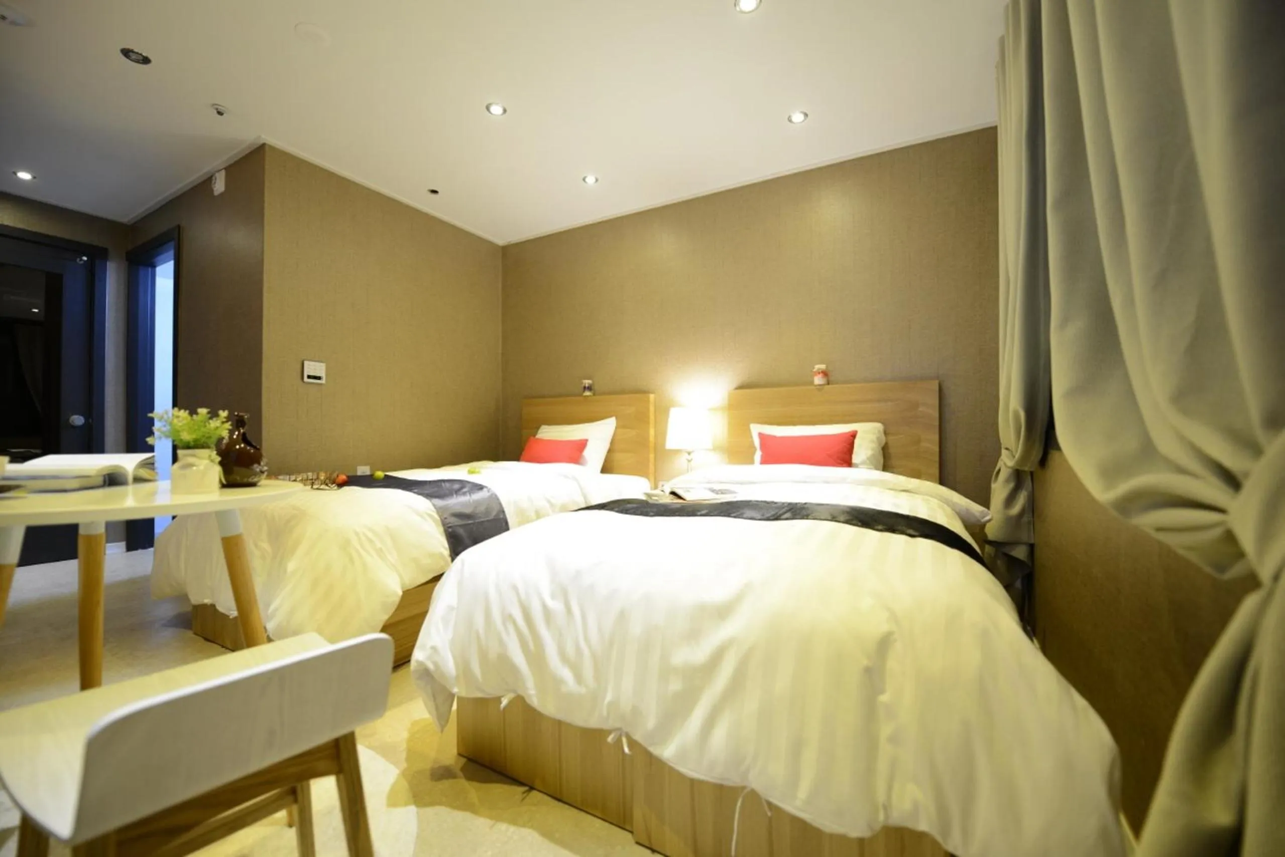 Bed in Dunsan Graytone Hotel