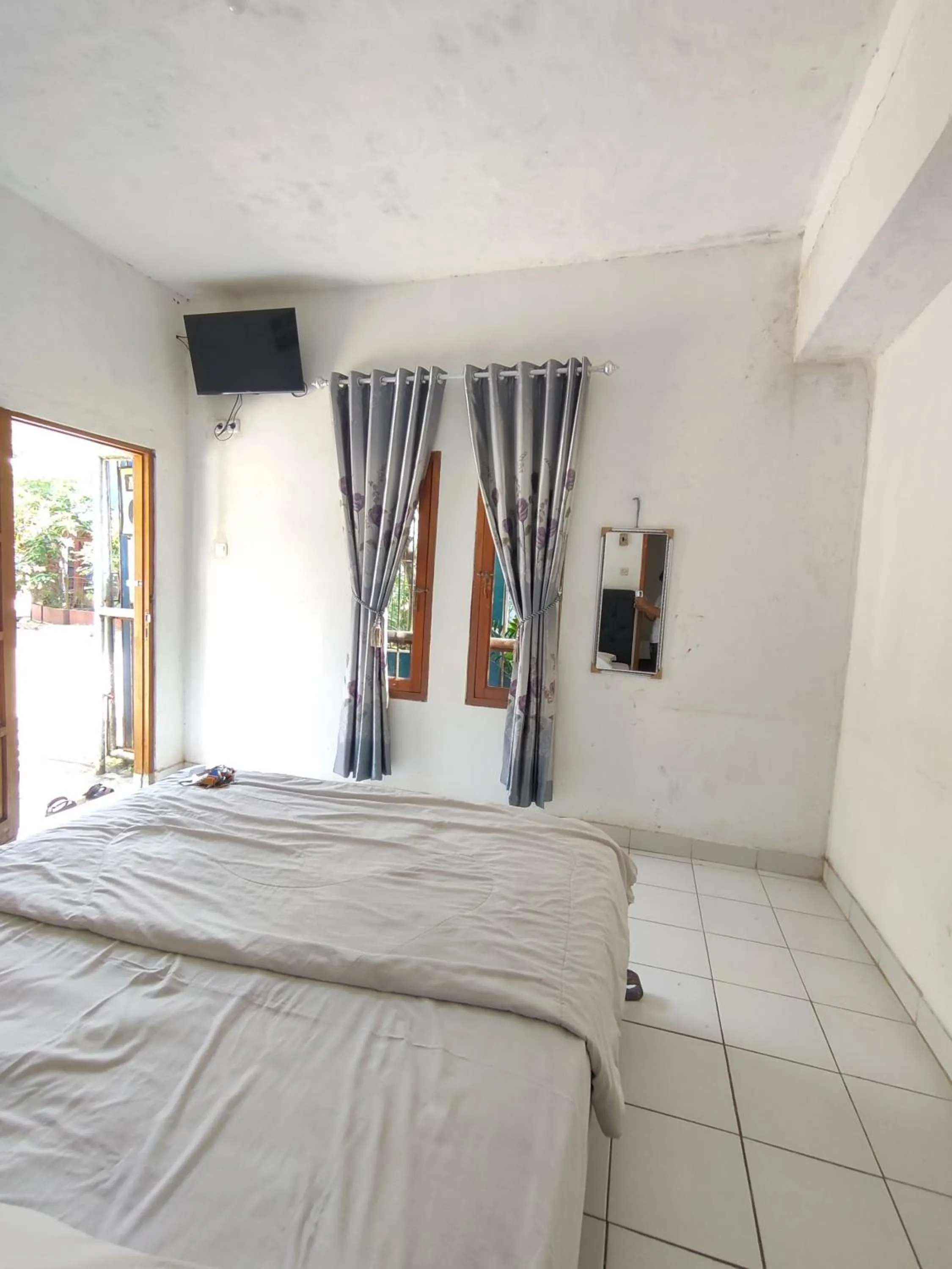 Bed in Penginapan Nurmega jaya