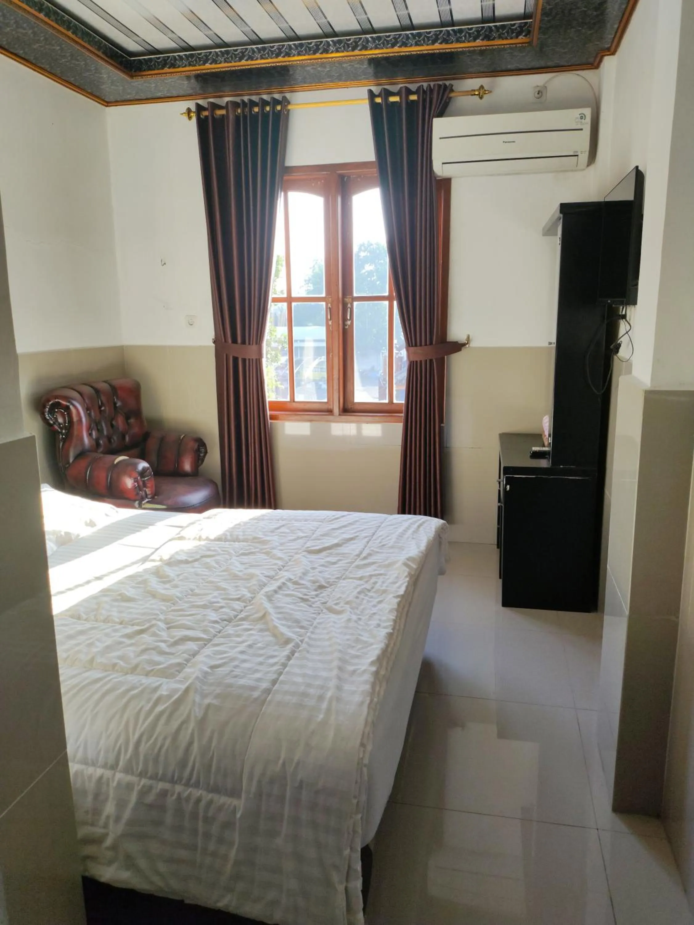 Bed in Penginapan Nurmega jaya