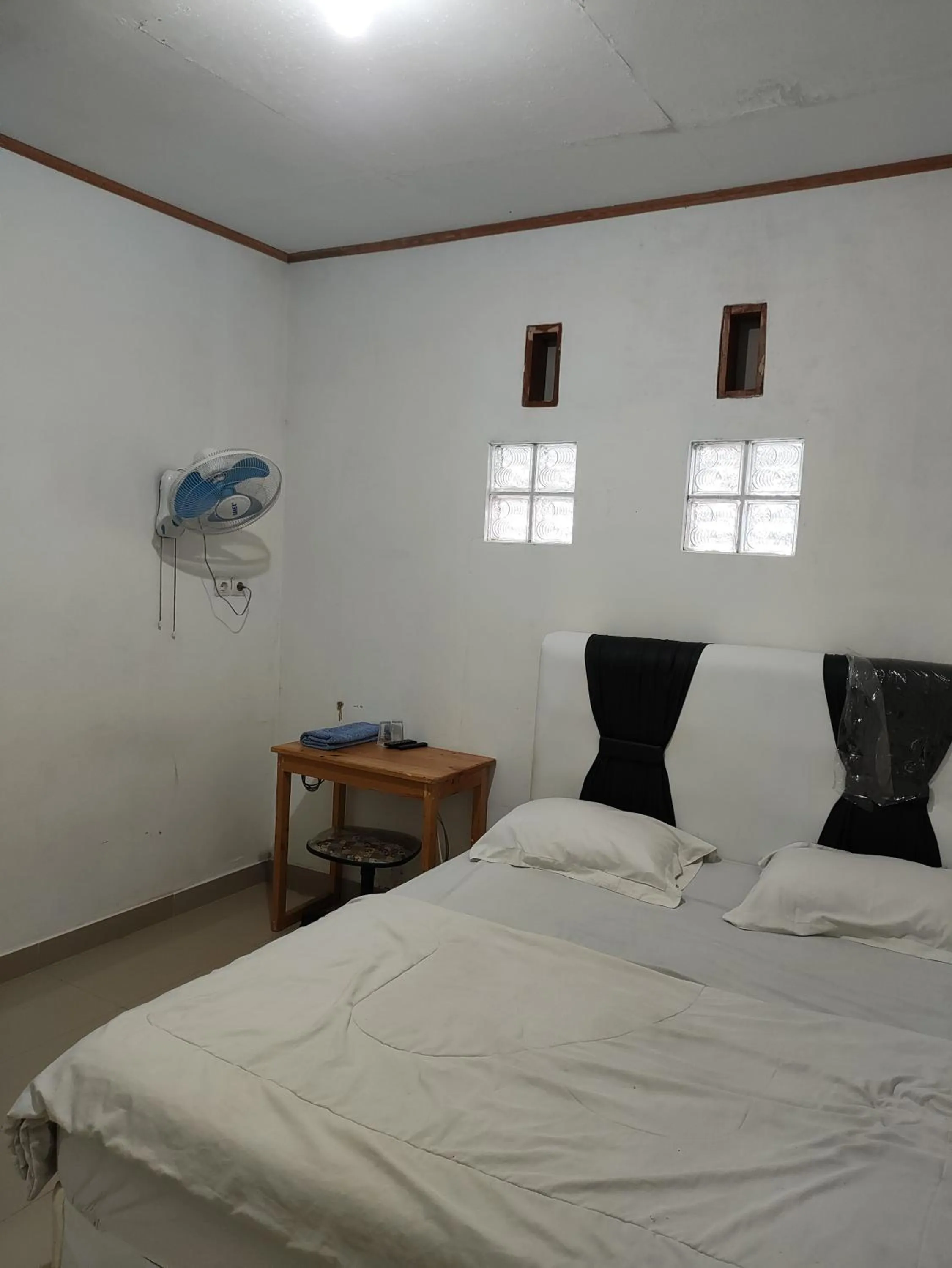 Bed in Penginapan Nurmega jaya