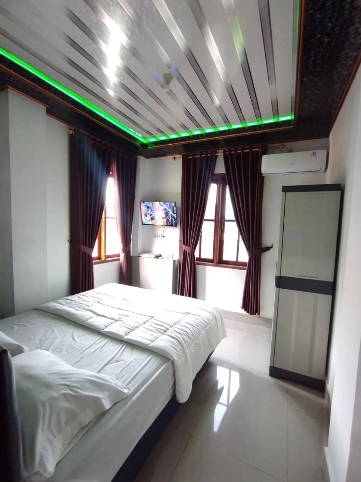 Bed in Penginapan Nurmega jaya