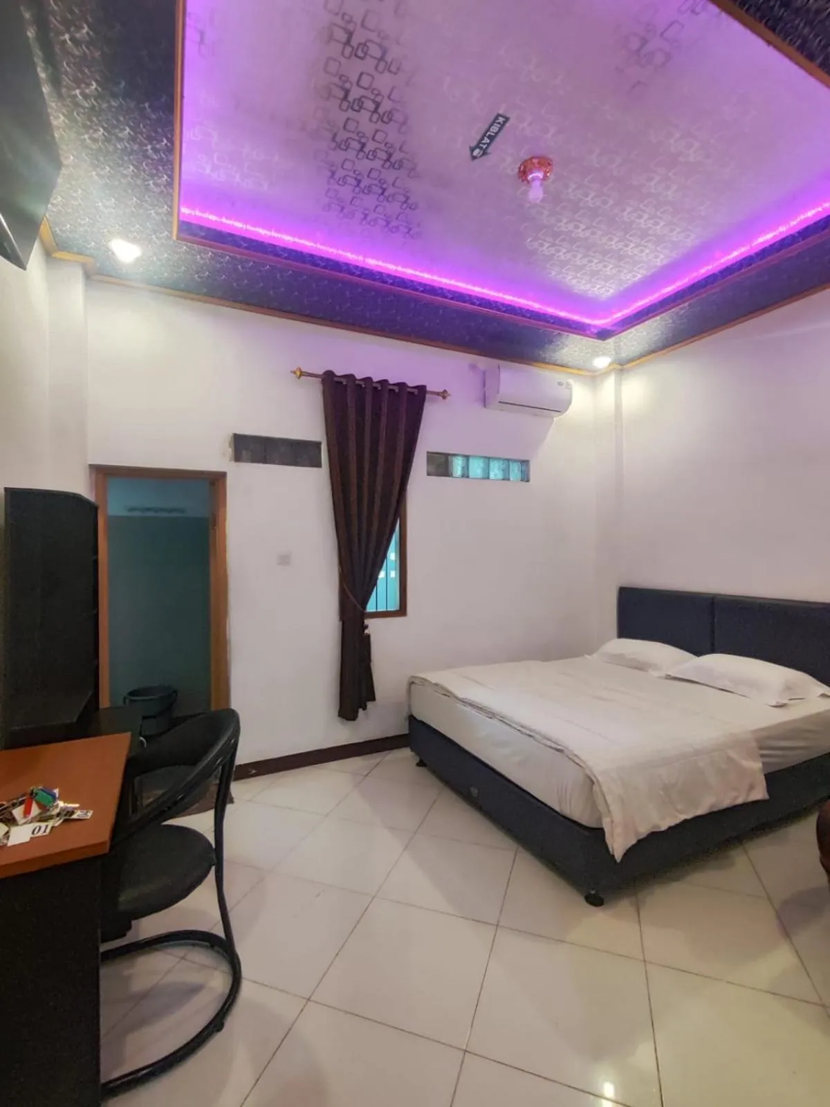 Bed in Penginapan Nurmega jaya