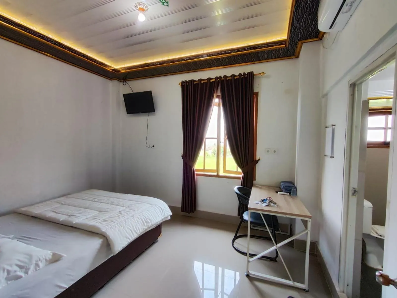 Bed in Penginapan Nurmega jaya