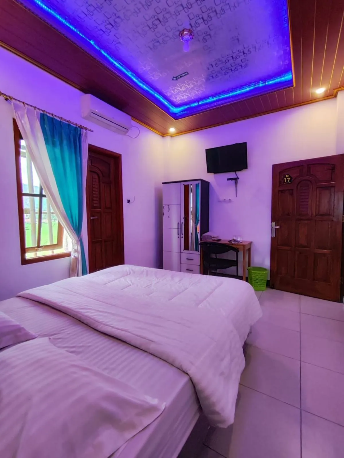 Bed in Penginapan Nurmega jaya