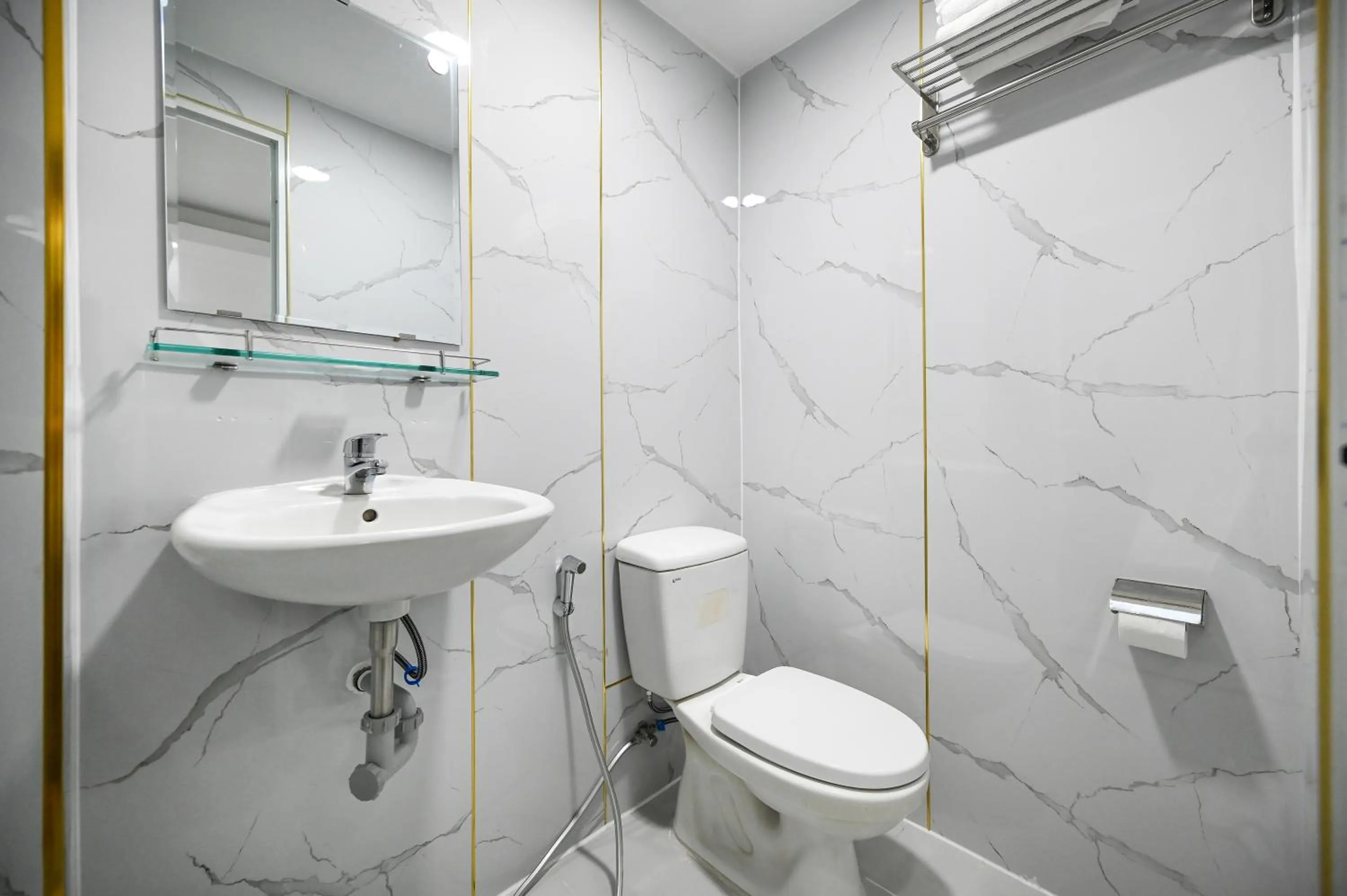 Toilet in YoKo Airport Saigon Hotel