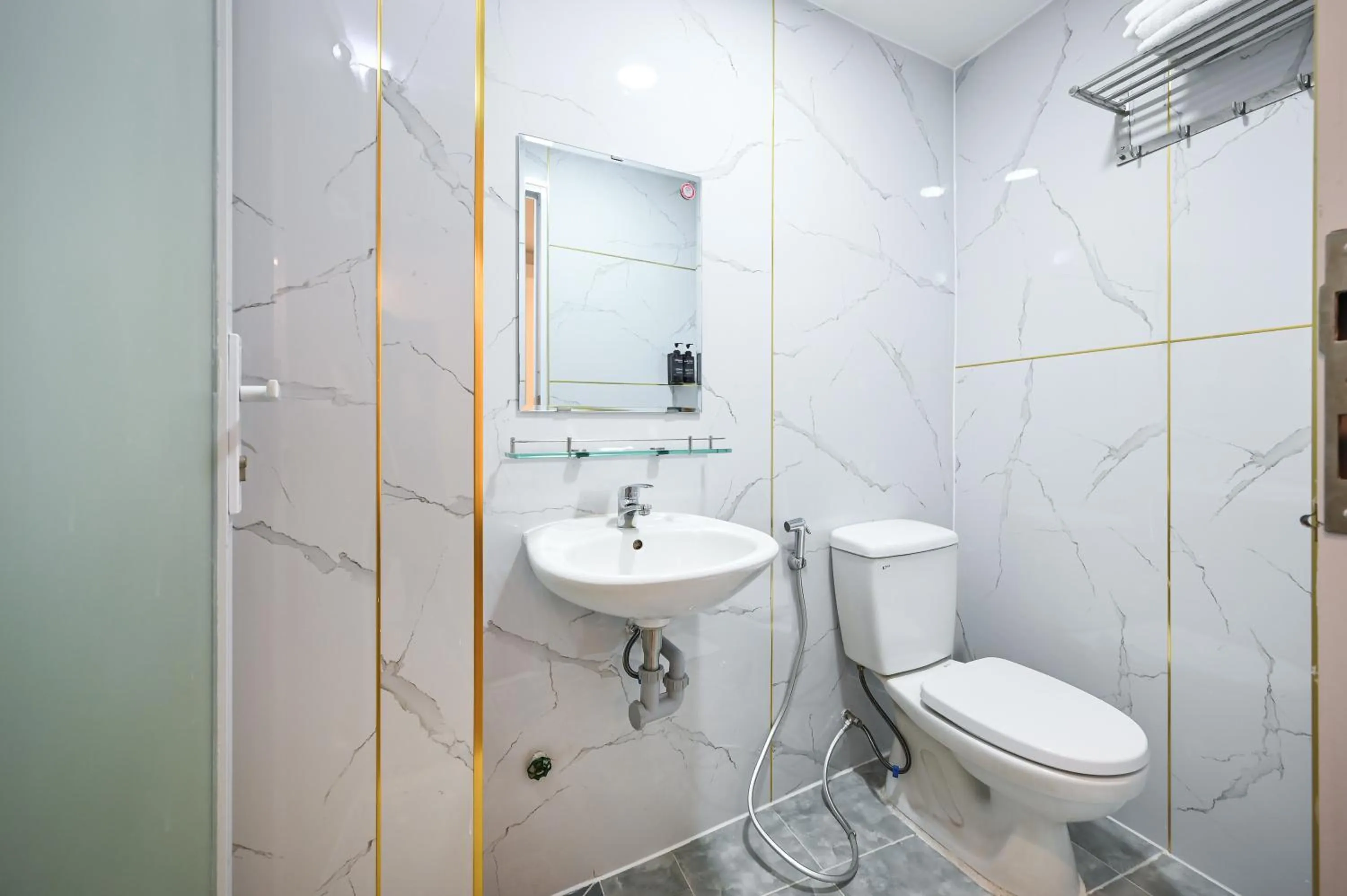 Toilet in YoKo Airport Saigon Hotel