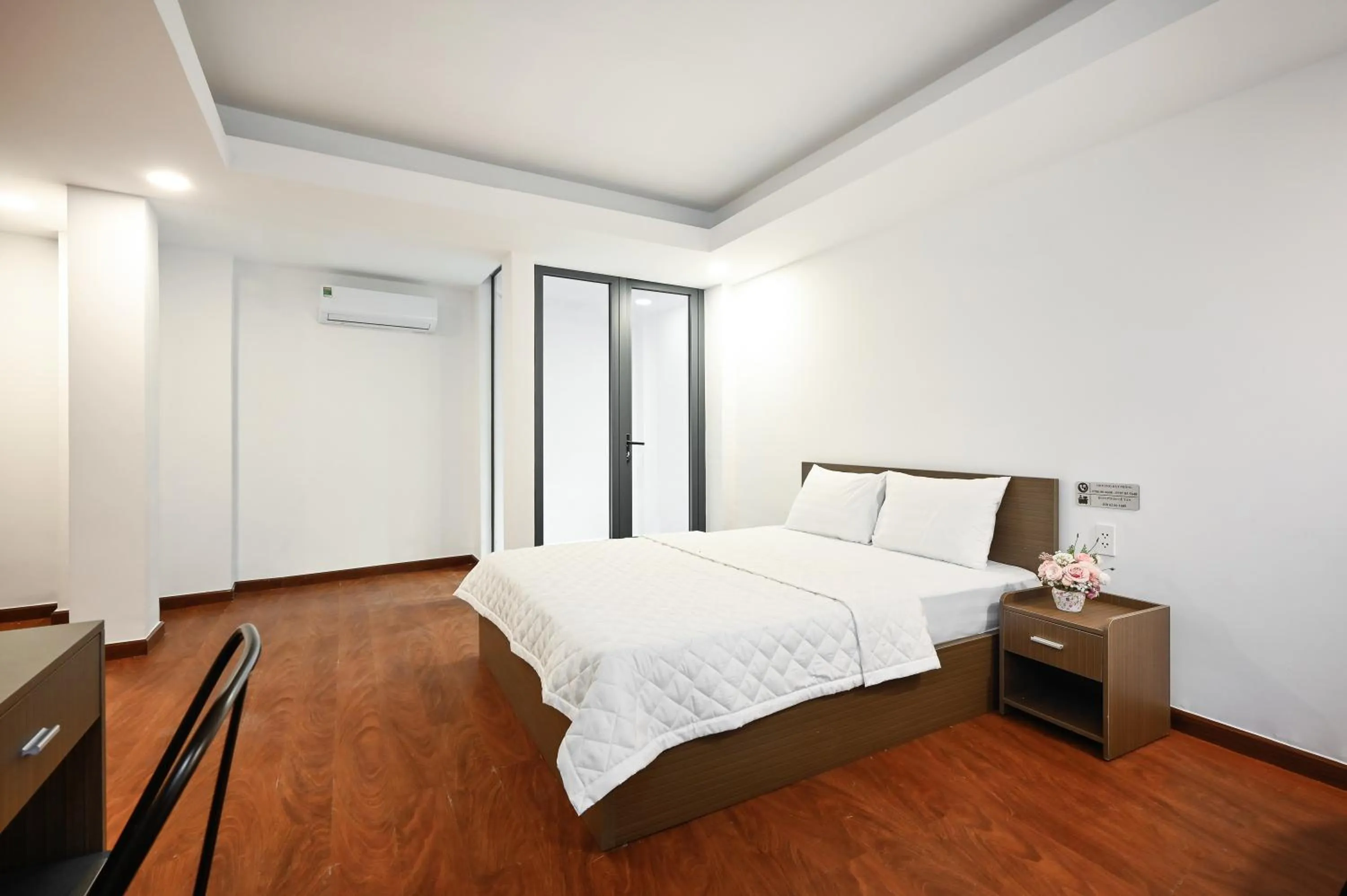 Bed in YoKo Airport Saigon Hotel