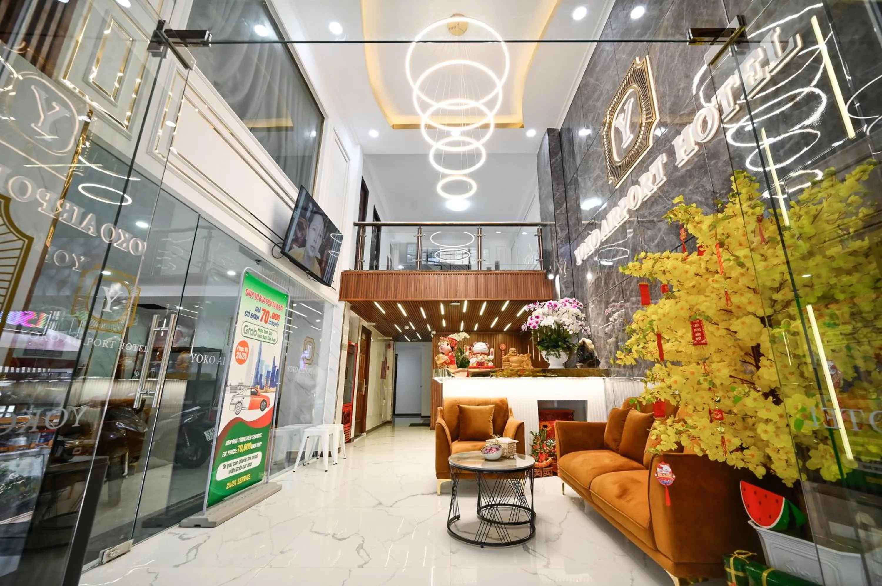 Seating area in YoKo Airport Saigon Hotel