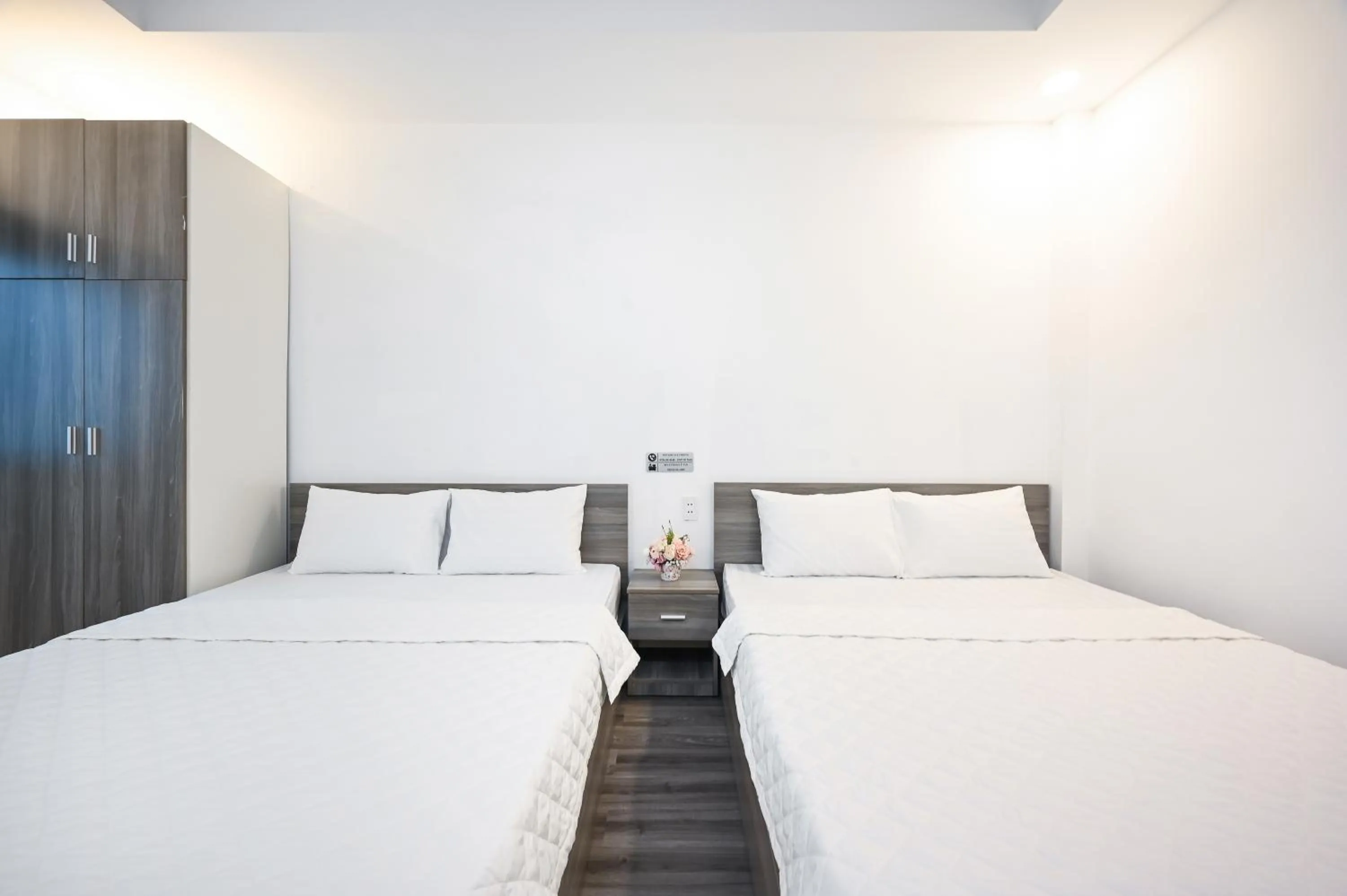 Bed in YoKo Airport Saigon Hotel