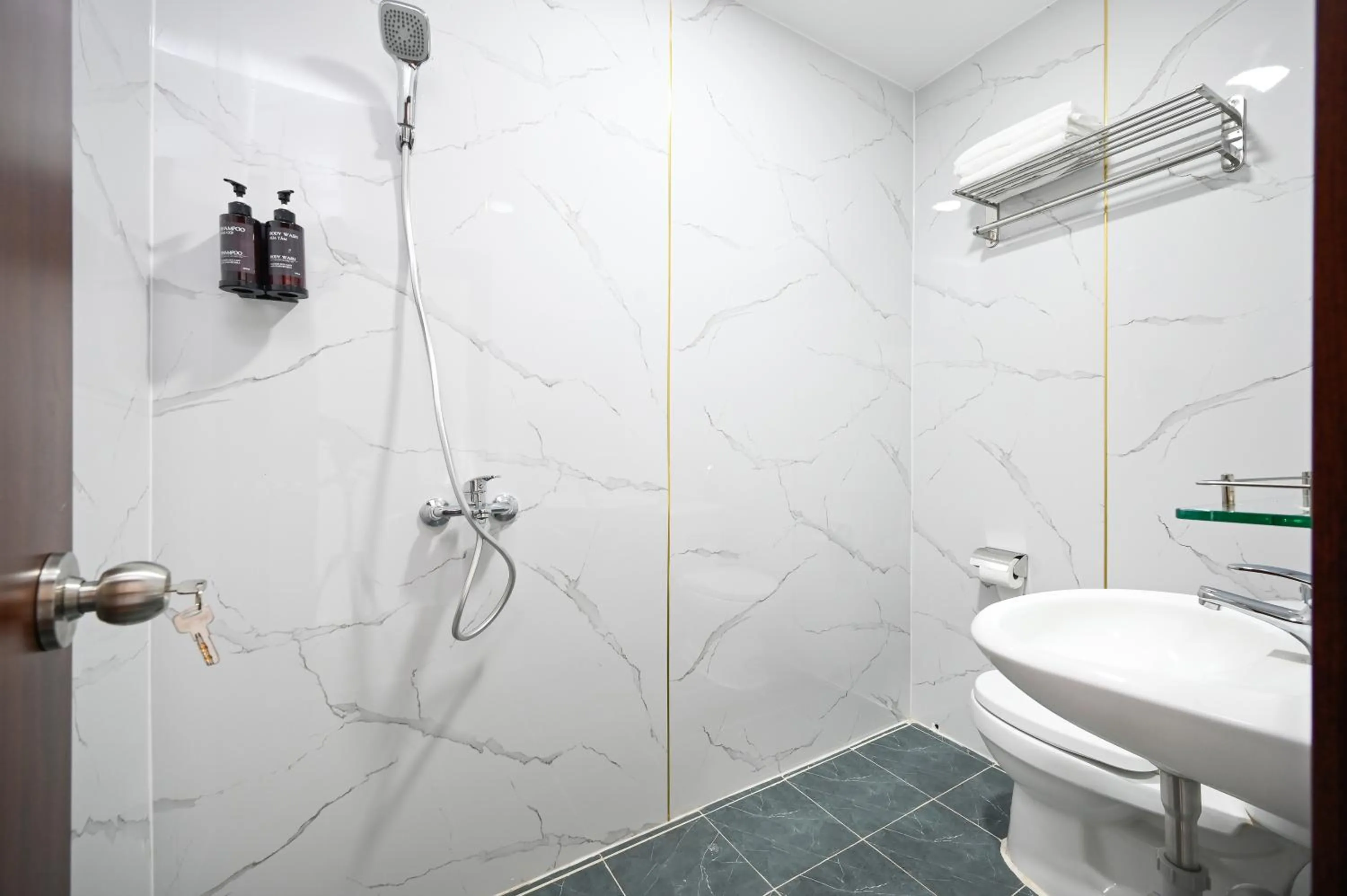 Toilet in YoKo Airport Saigon Hotel