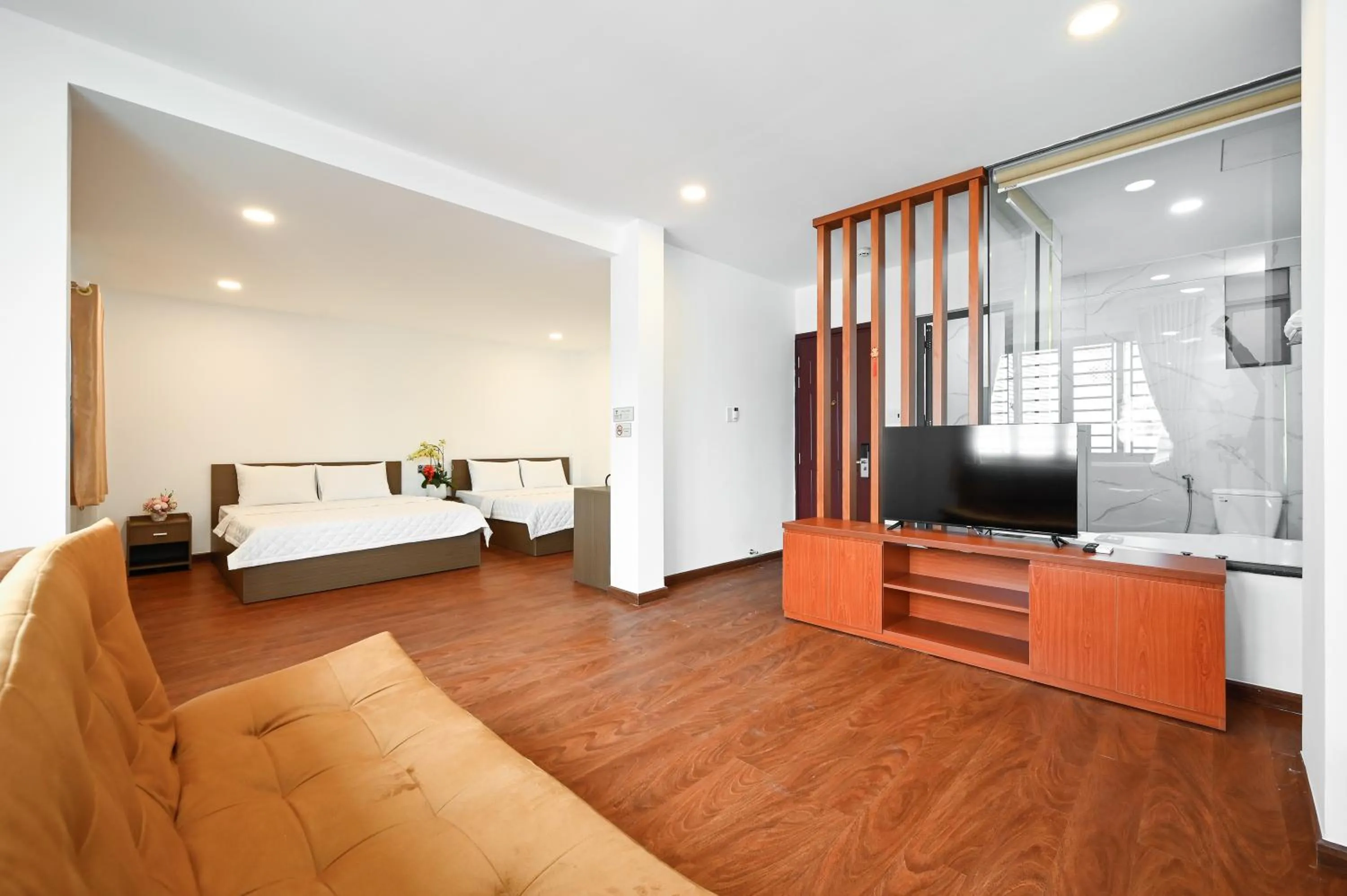 Photo of the whole room, Bed in YoKo Airport Saigon Hotel