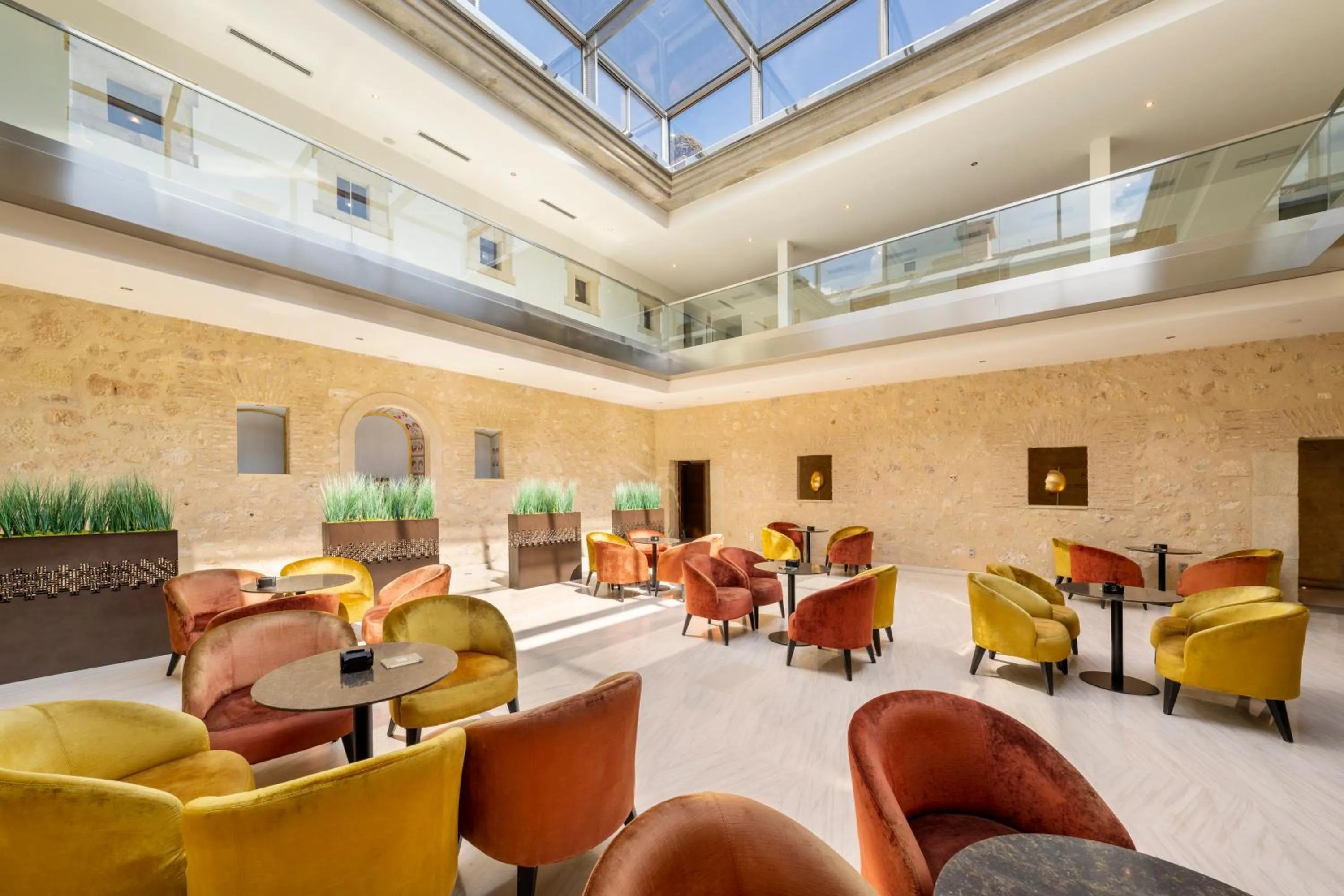 Communal lounge/ TV room in Áurea Convento Capuchinos by Eurostars Hotel Company