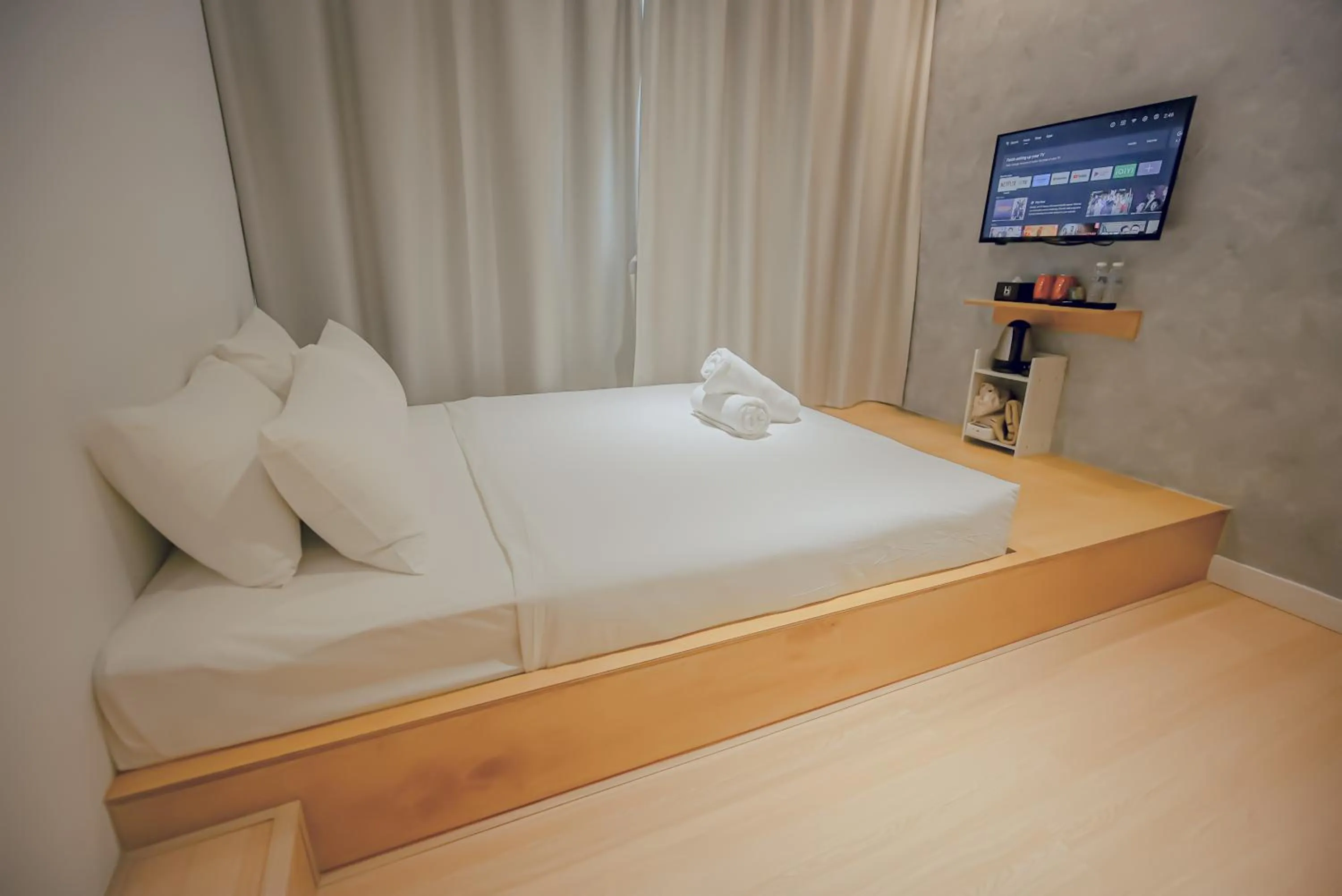 Bed in Double H Boutique Hotel