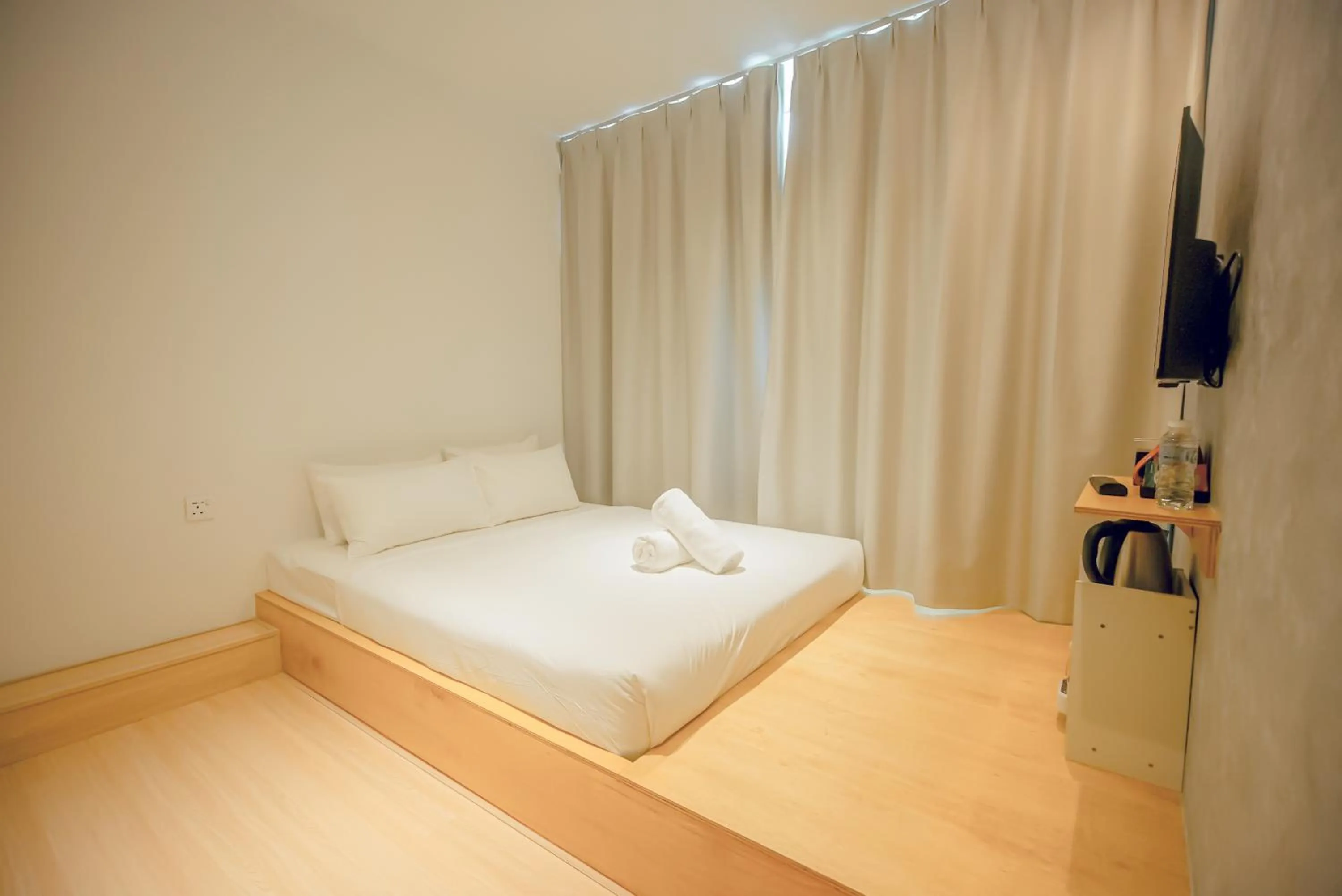 Bed in Double H Boutique Hotel