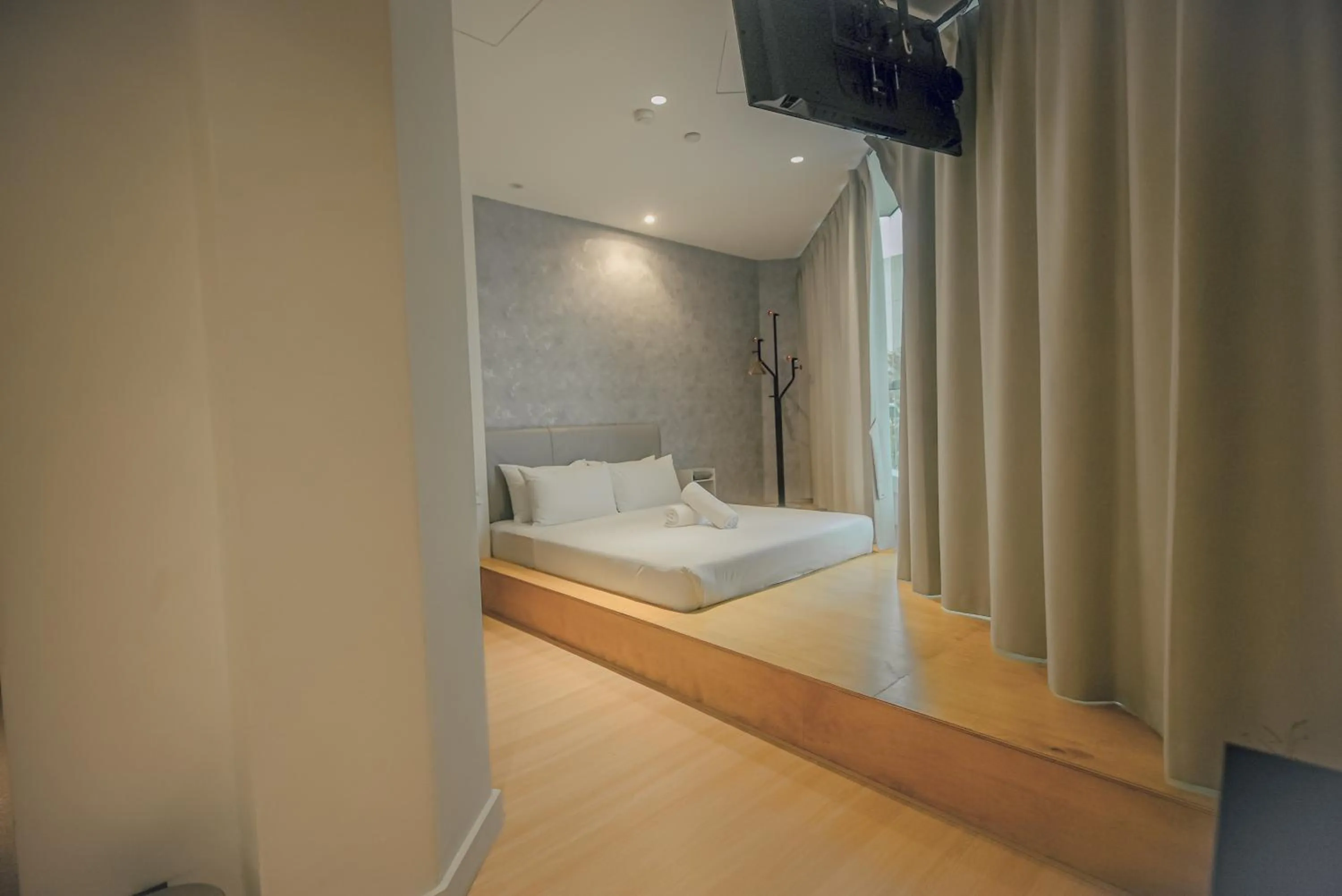 Bed in Double H Boutique Hotel