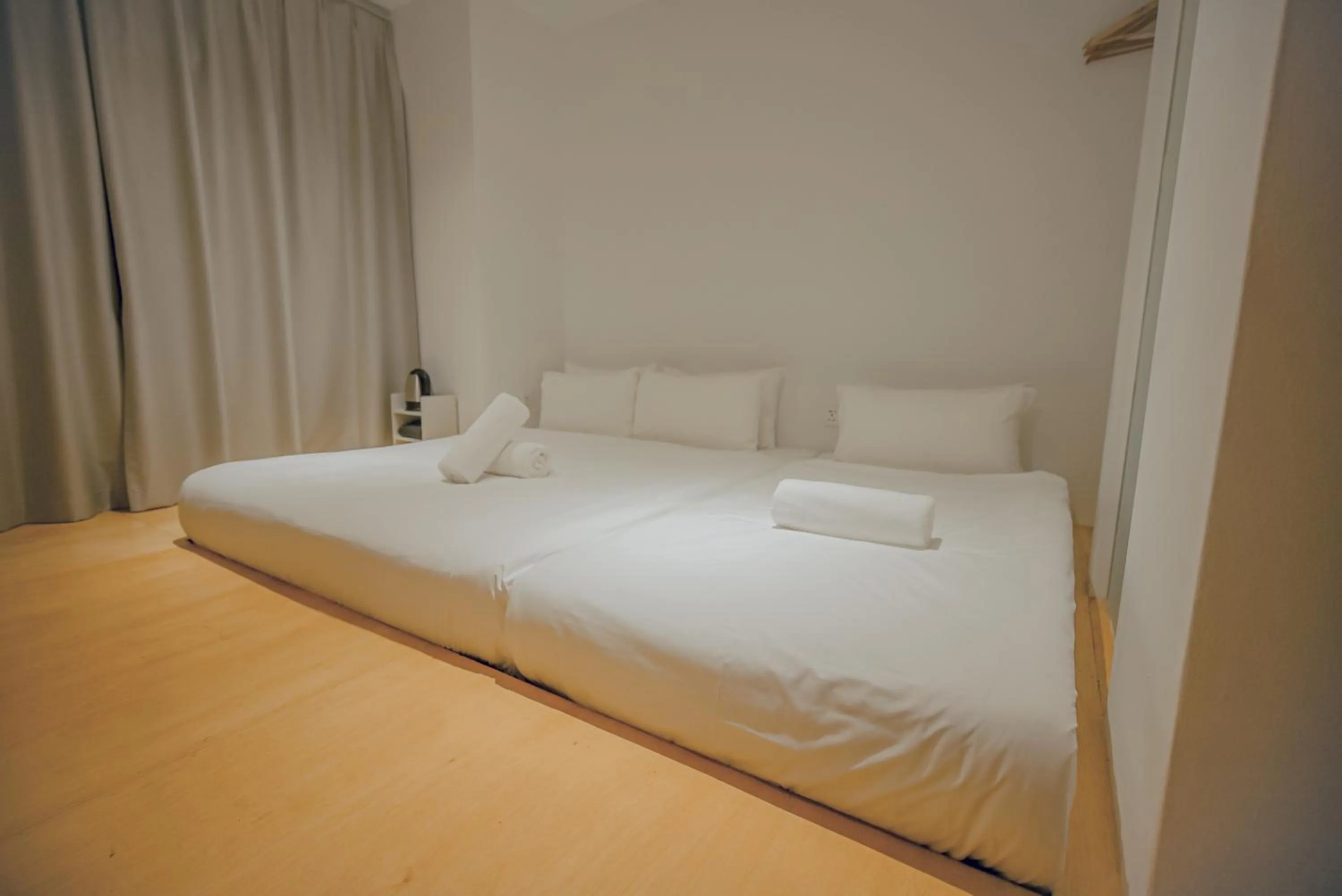 Bed in Double H Boutique Hotel