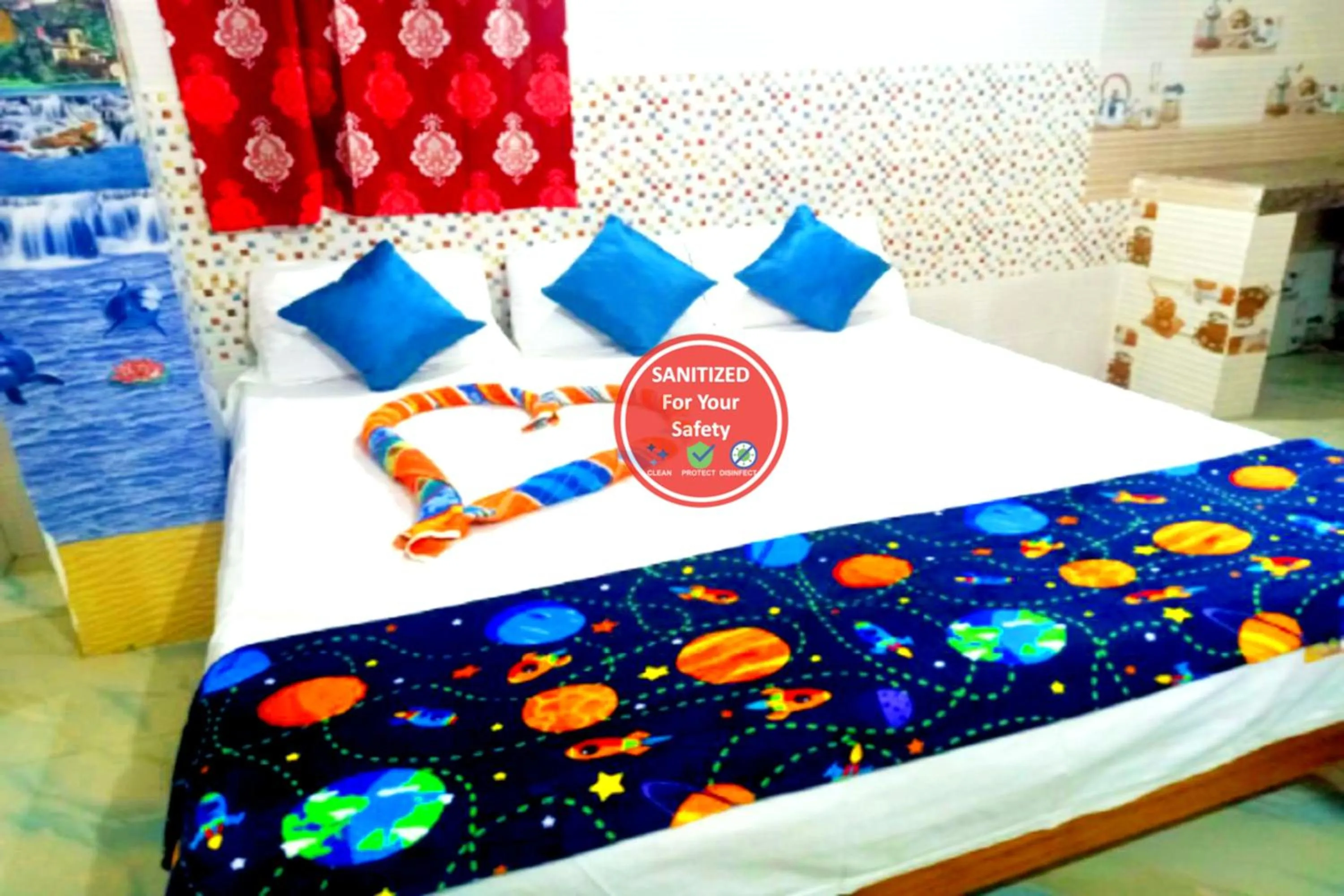 Bed in Goroomgo Pranab Sadan Puri