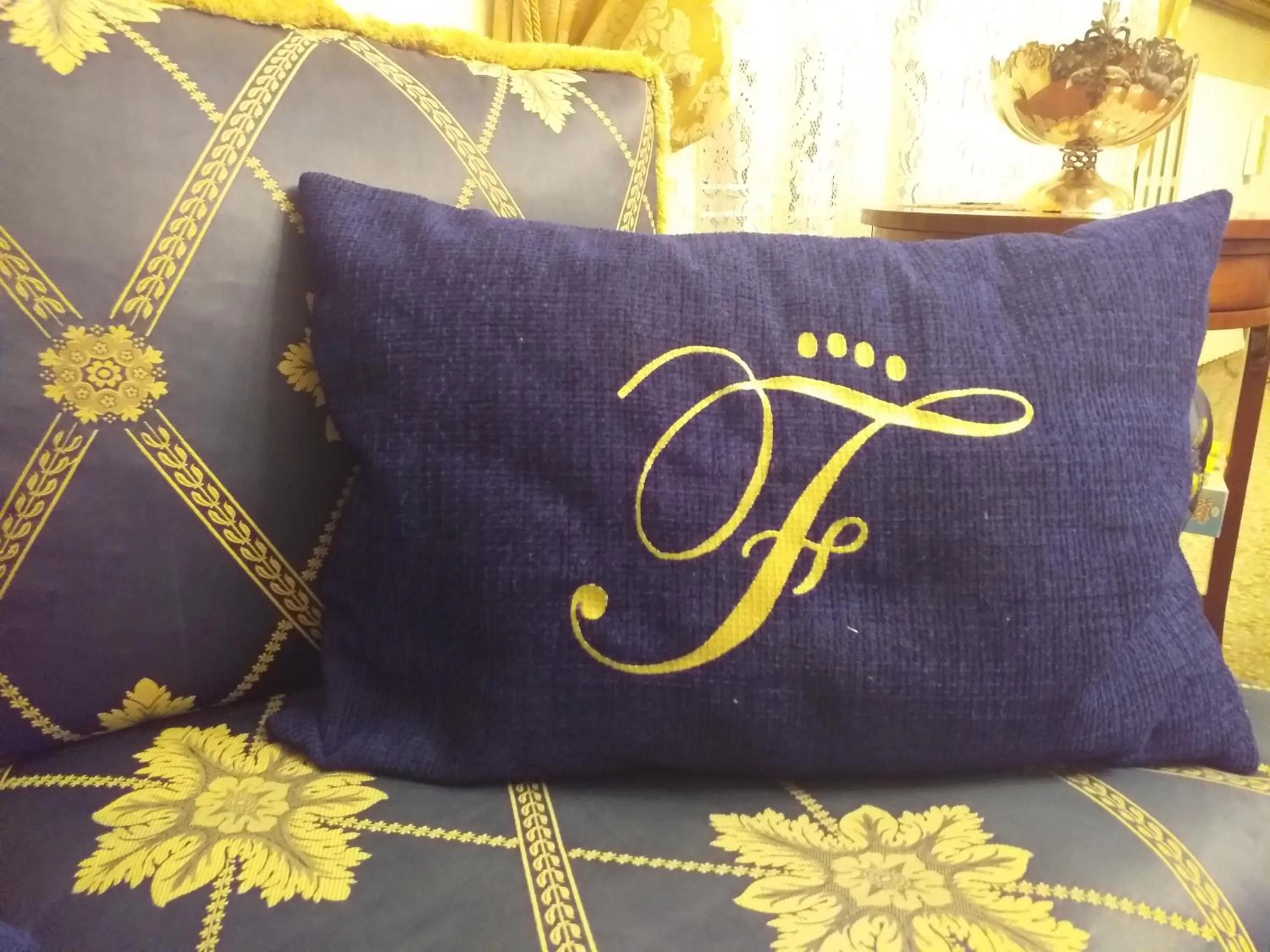 Property logo or sign in Falli Exclusive Rooms and Breakfast -Boutique B&B-