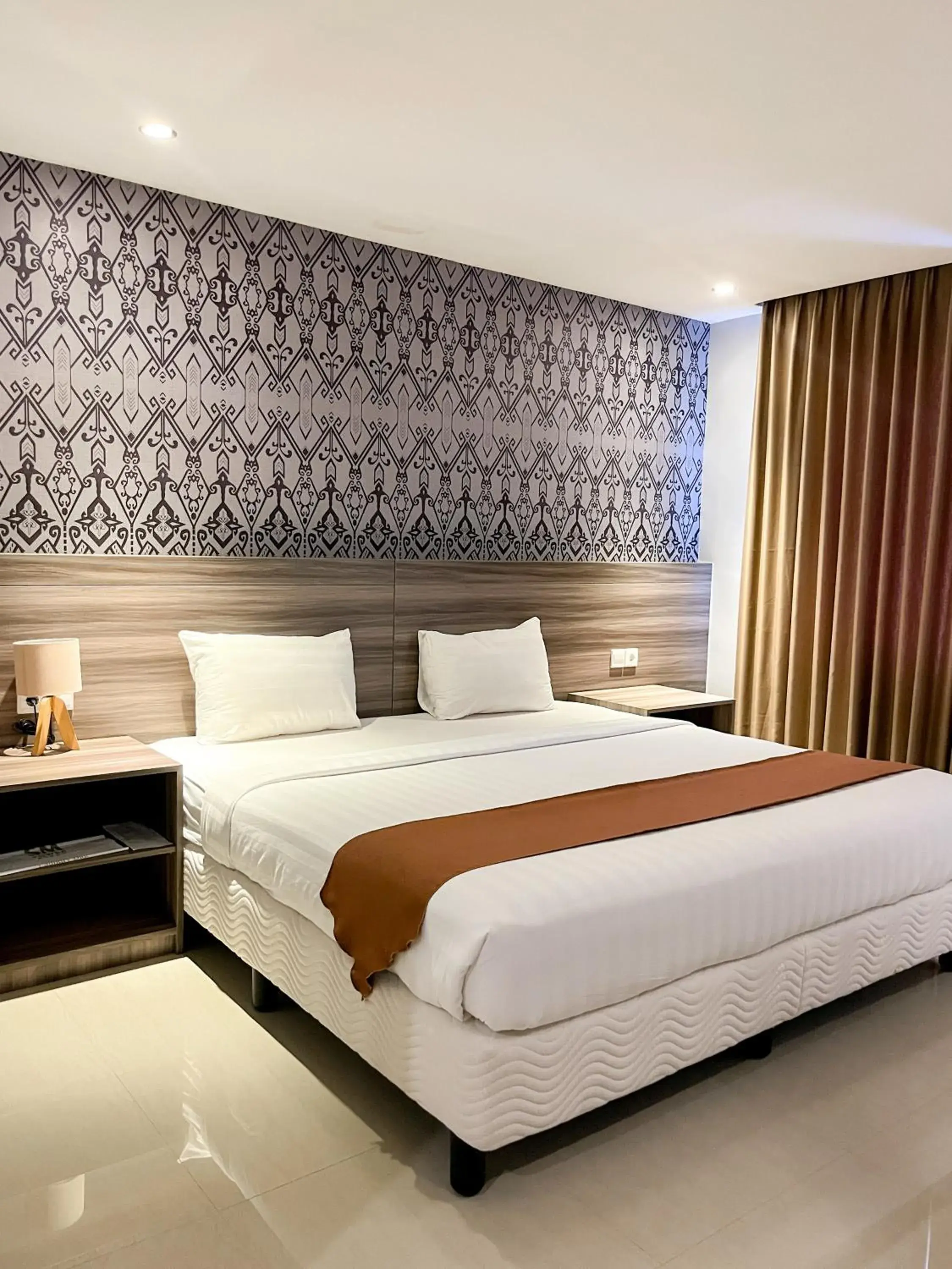 Deluxe King Room in SM Tower Hotel and Convention Berau Deluxe King Room in SM Tower Hotel and Convention Berau