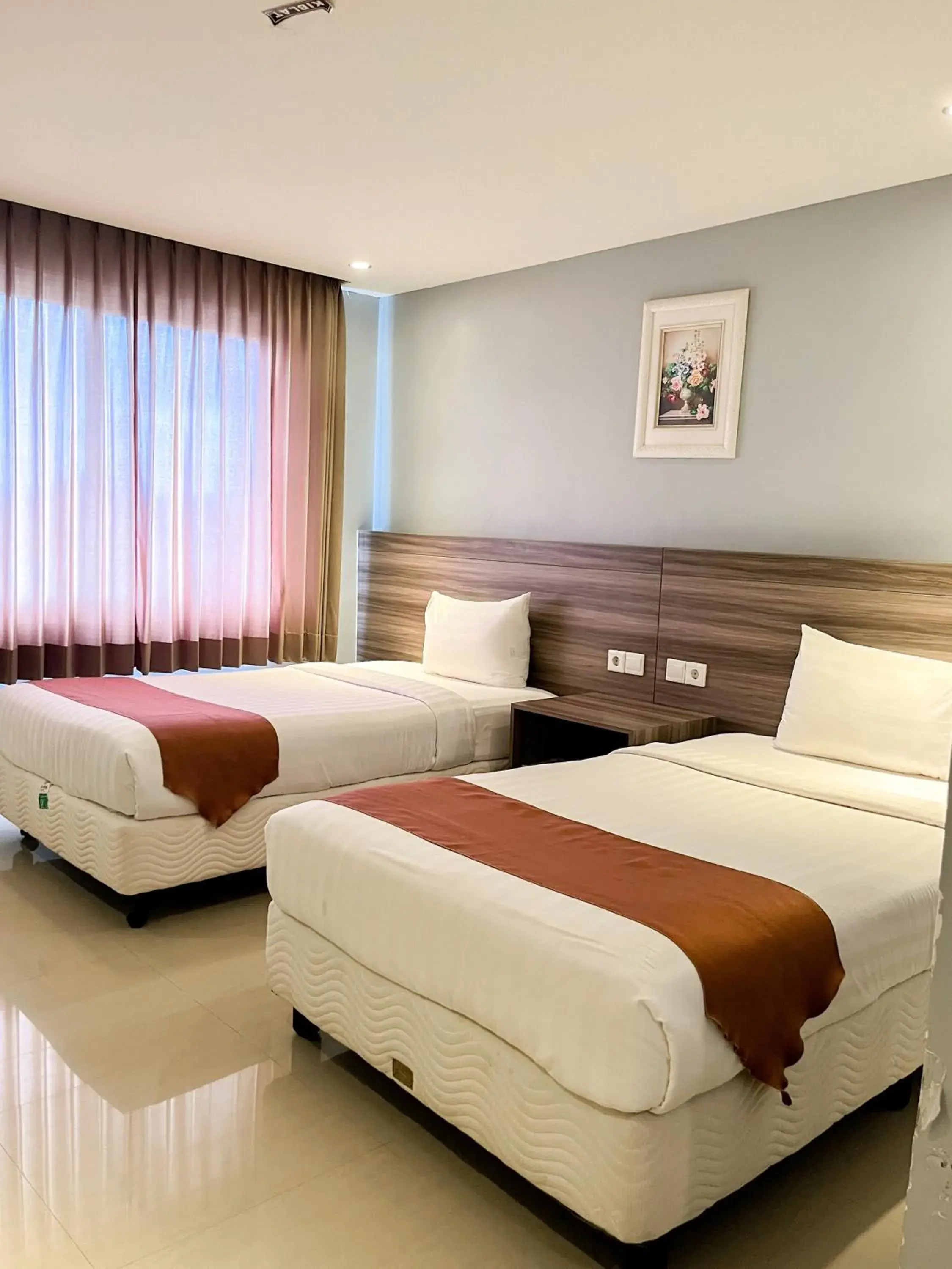 Superior Twin Room in SM Tower Hotel and Convention Berau Superior Twin Room in SM Tower Hotel and Convention Berau