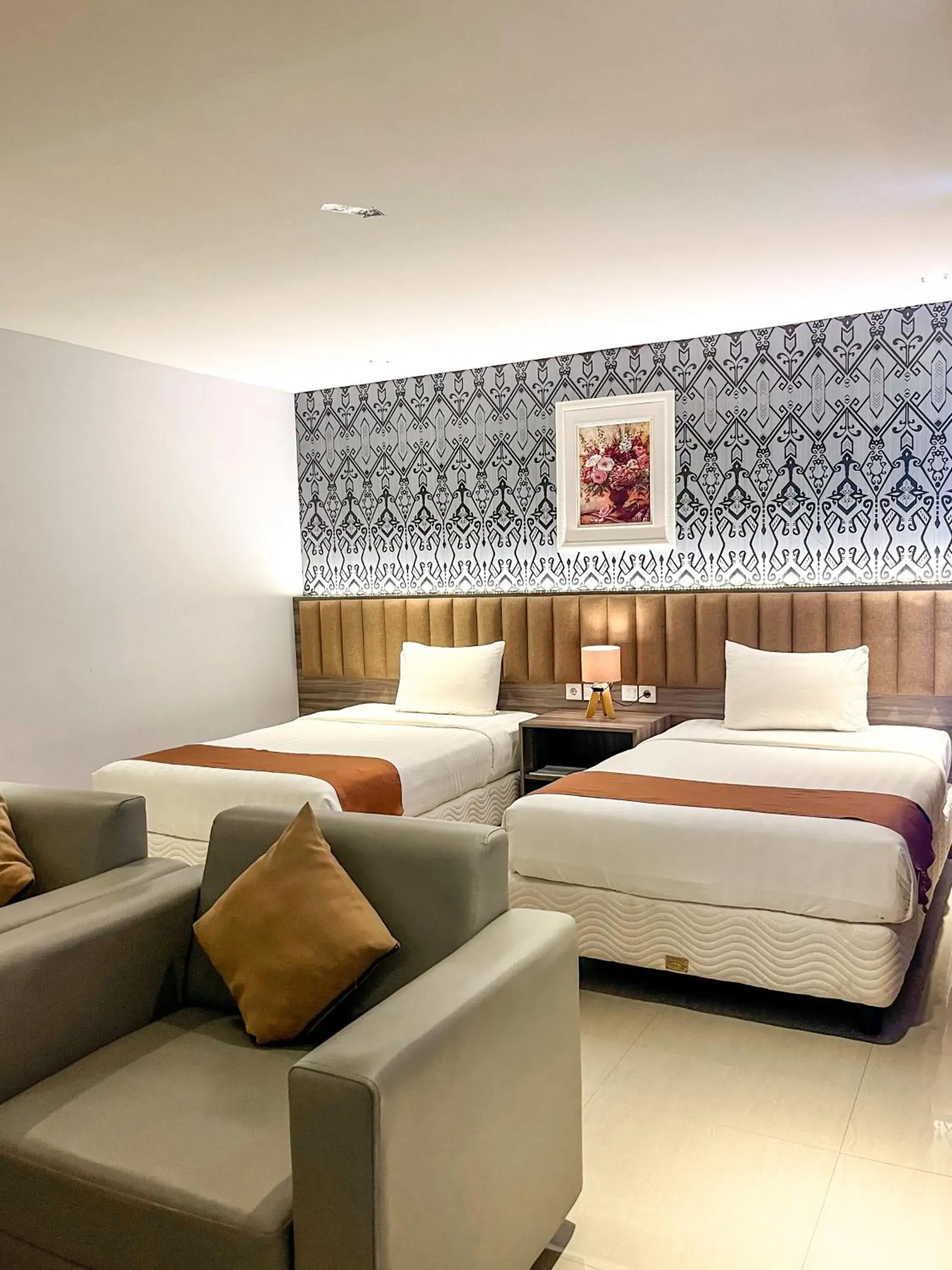 Twin Room in SM Tower Hotel and Convention Berau Twin Room in SM Tower Hotel and Convention Berau