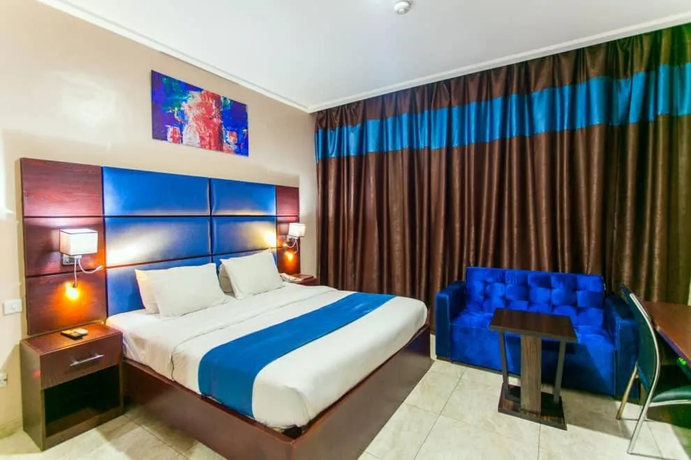 Bed in De Santos Hotel