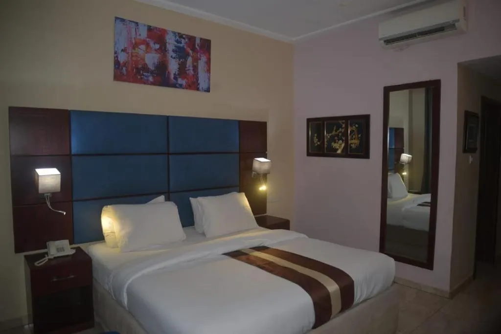 Bed in De Santos Hotel