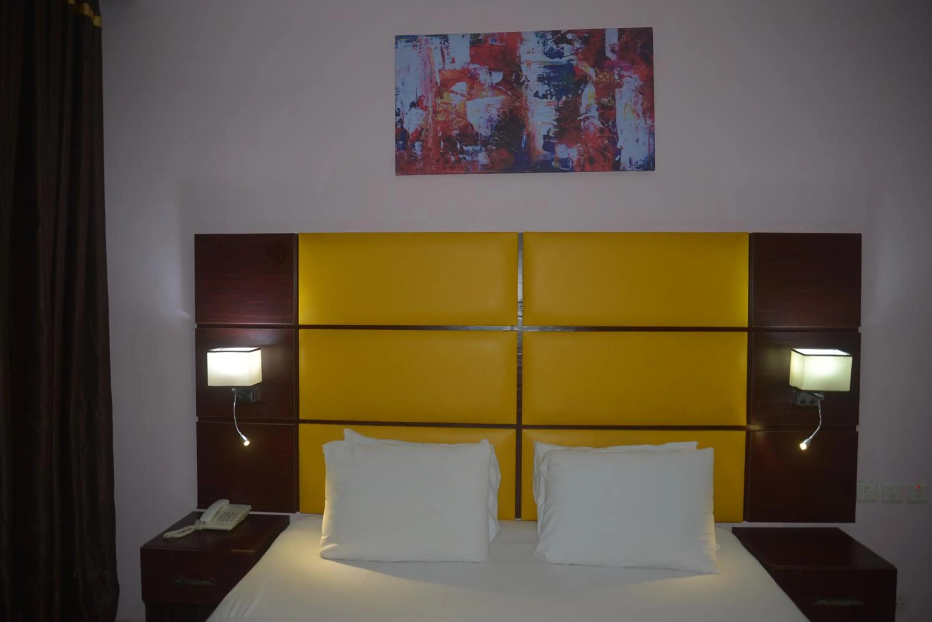 Bed in De Santos Hotel