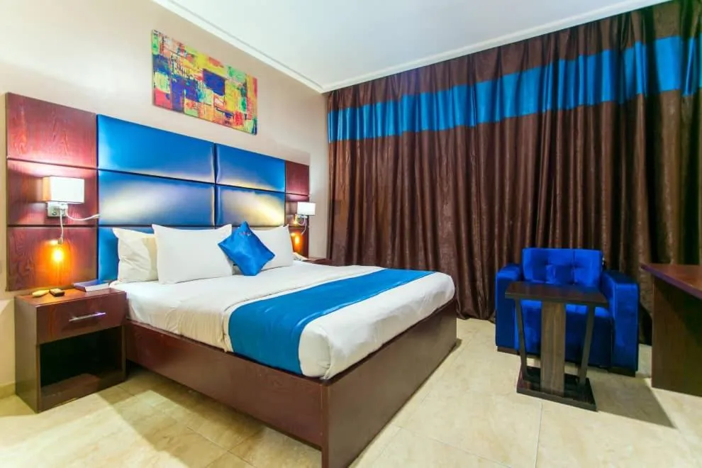 Bed in De Santos Hotel