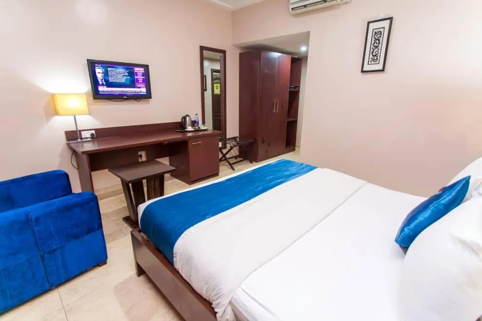 Bed in De Santos Hotel