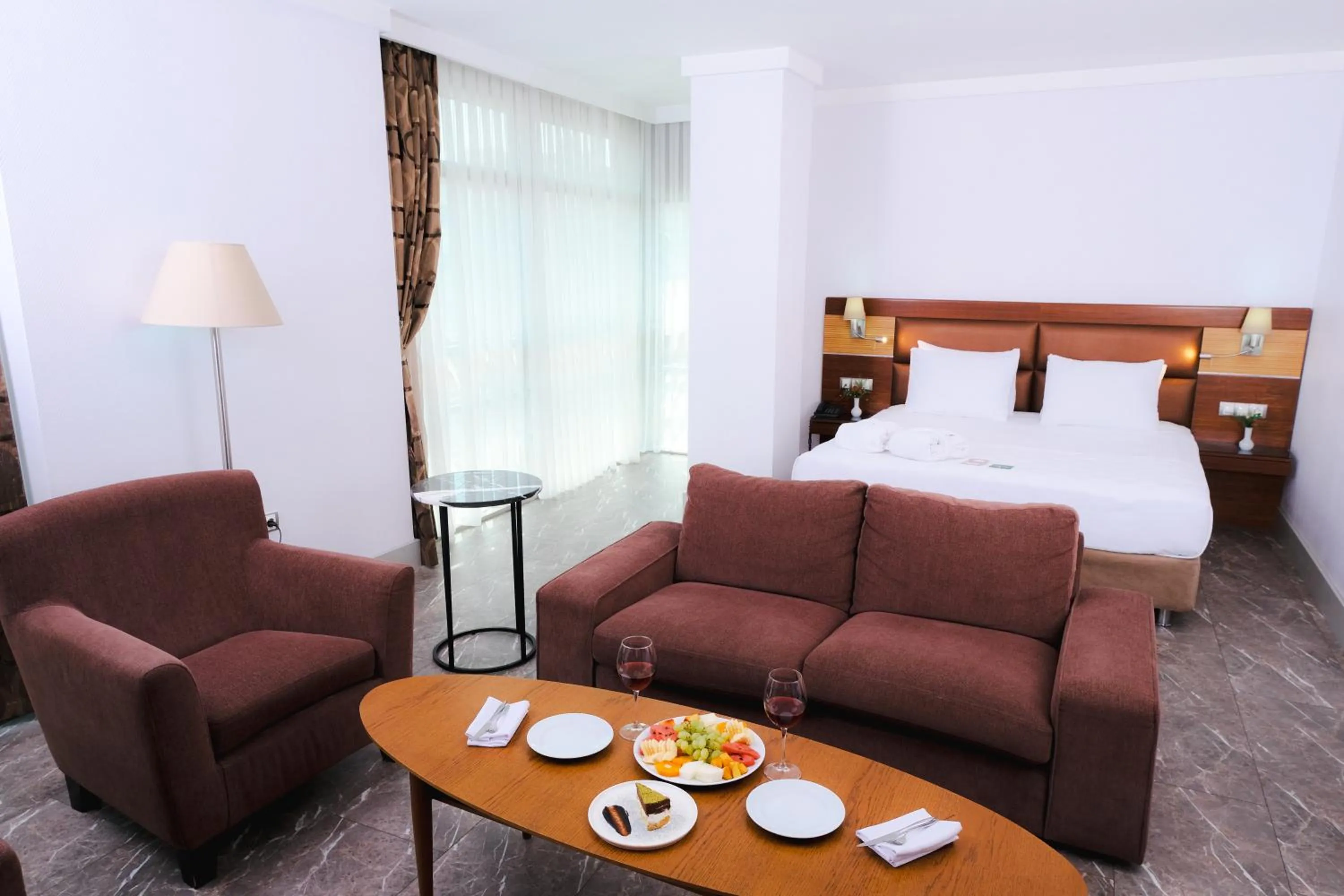 Living room, Bed in ARMİS HOTEL