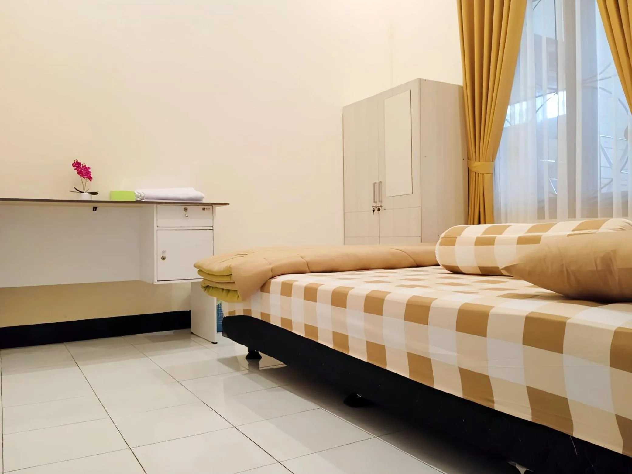 Bed in Penginapan Prambanan TRISAN