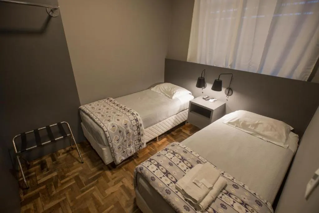 Bed in Ipê Hotel Express