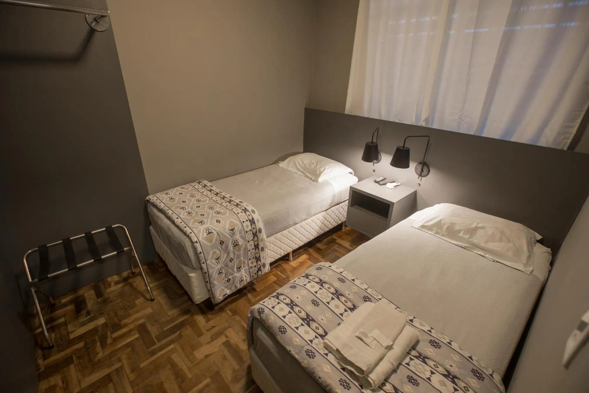 Bed in Ipê Hotel Express