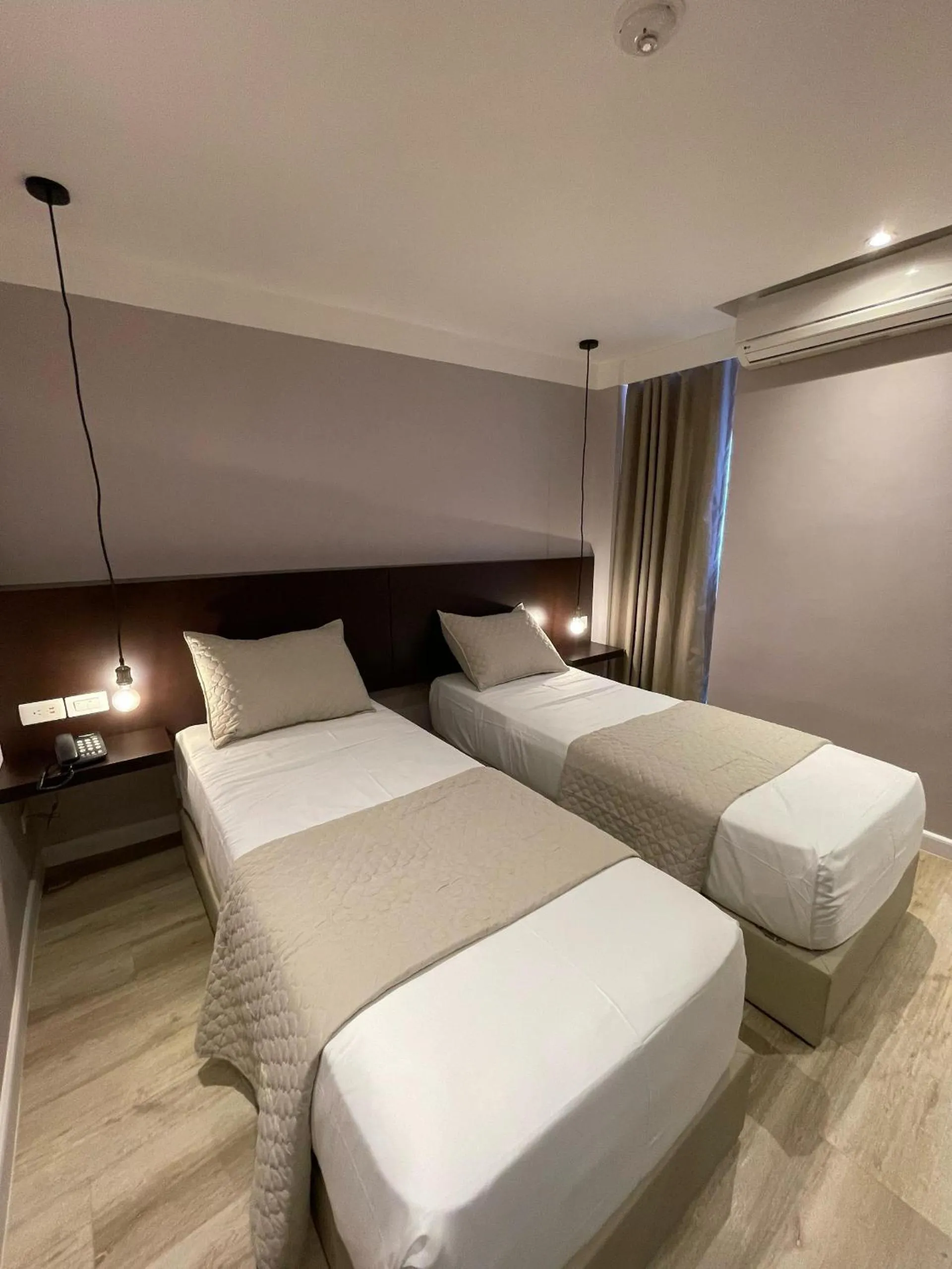 Bed in Hotel Grand Galaxie