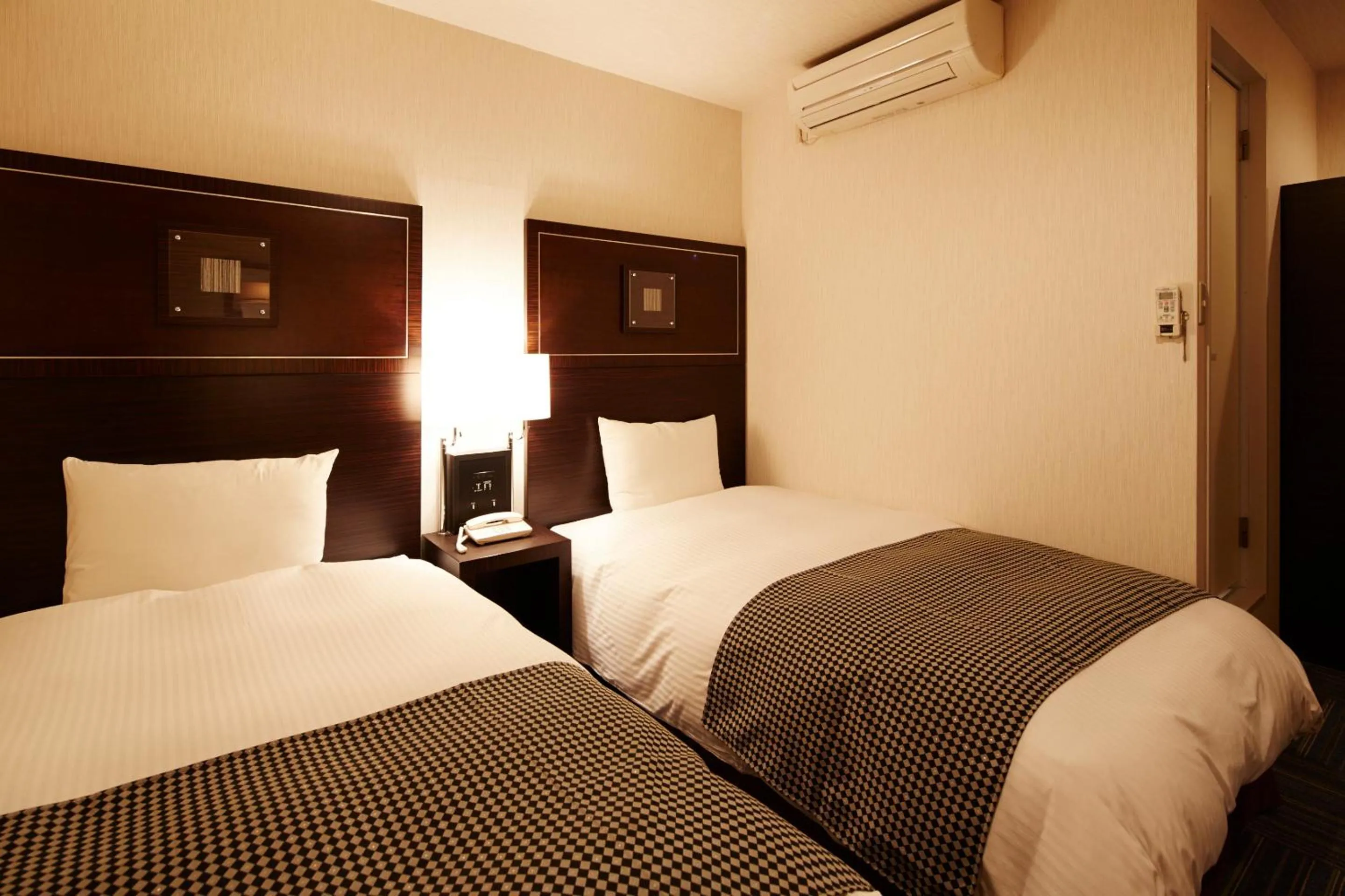 Photo of the whole room, Bed in Ariston Inn Kanda Kitakyusyu Airport