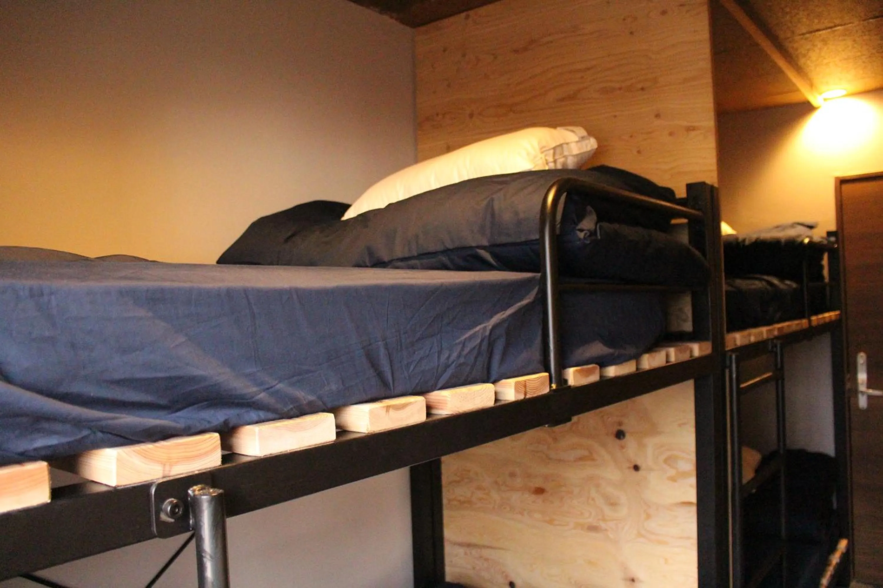 bunk bed, Bed in Kamp Houkan-cho Backpacker's Inn & Lounge