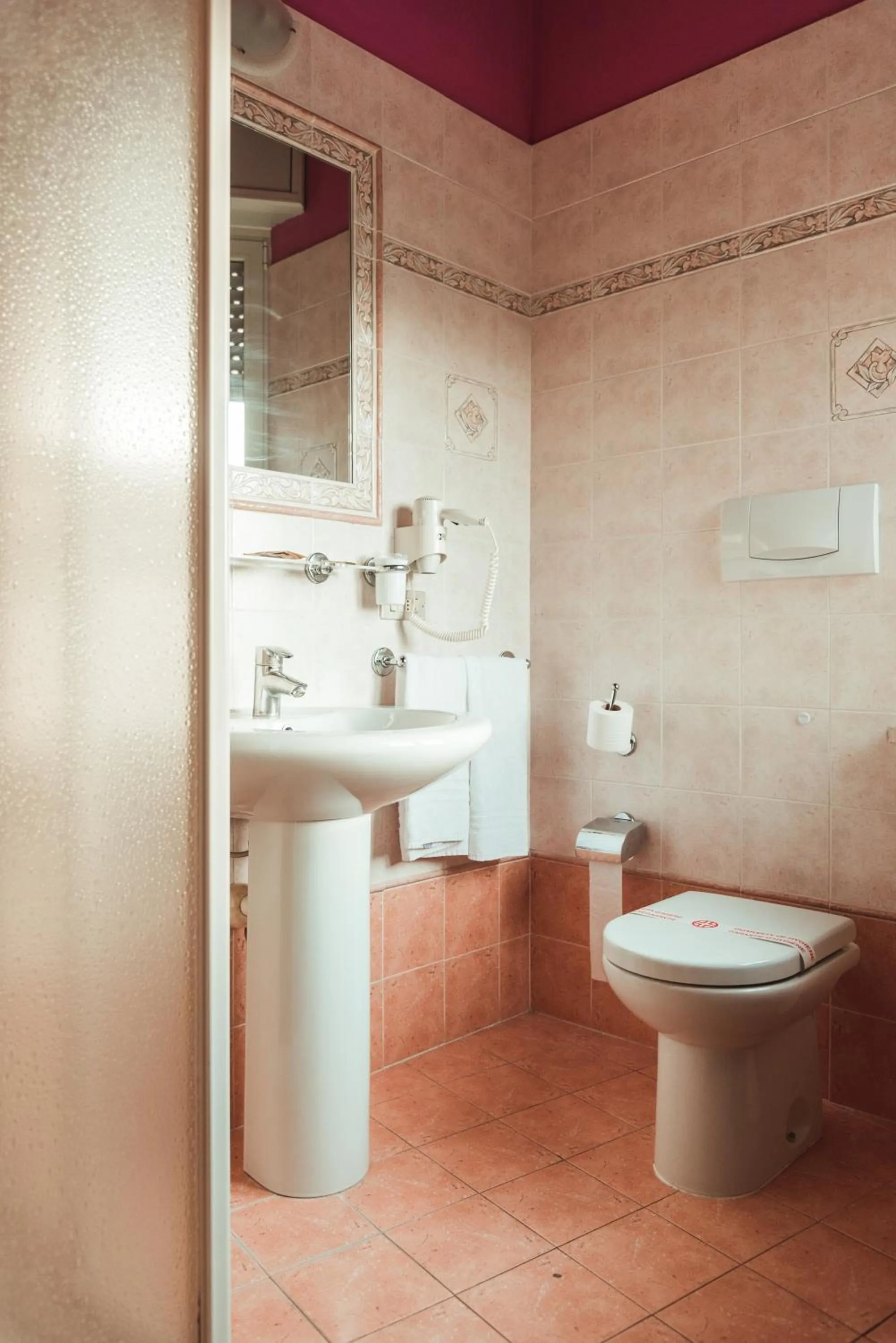 Bathroom in Hotel Benacus