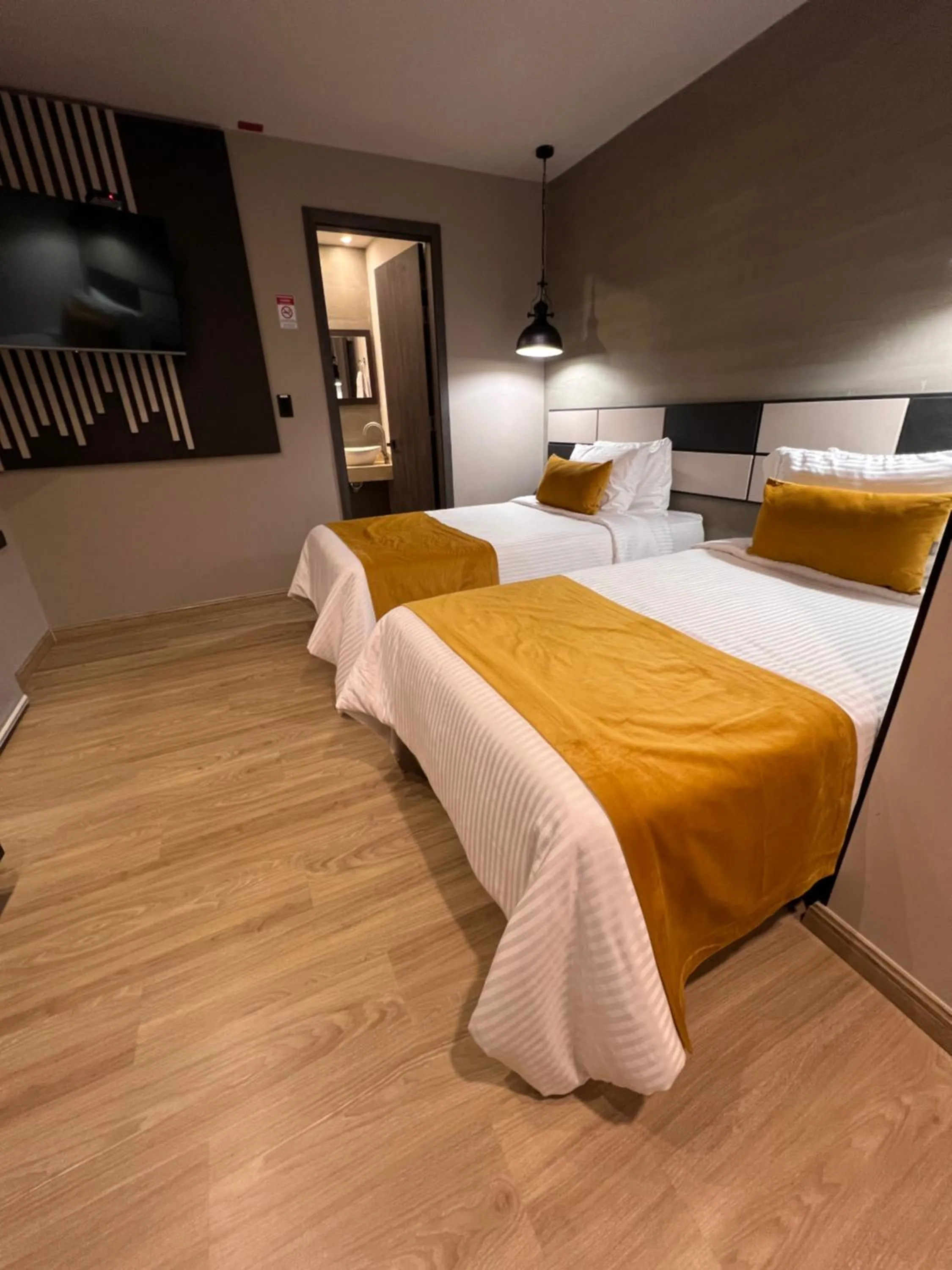 Bed in Balmoral Plaza Hotel